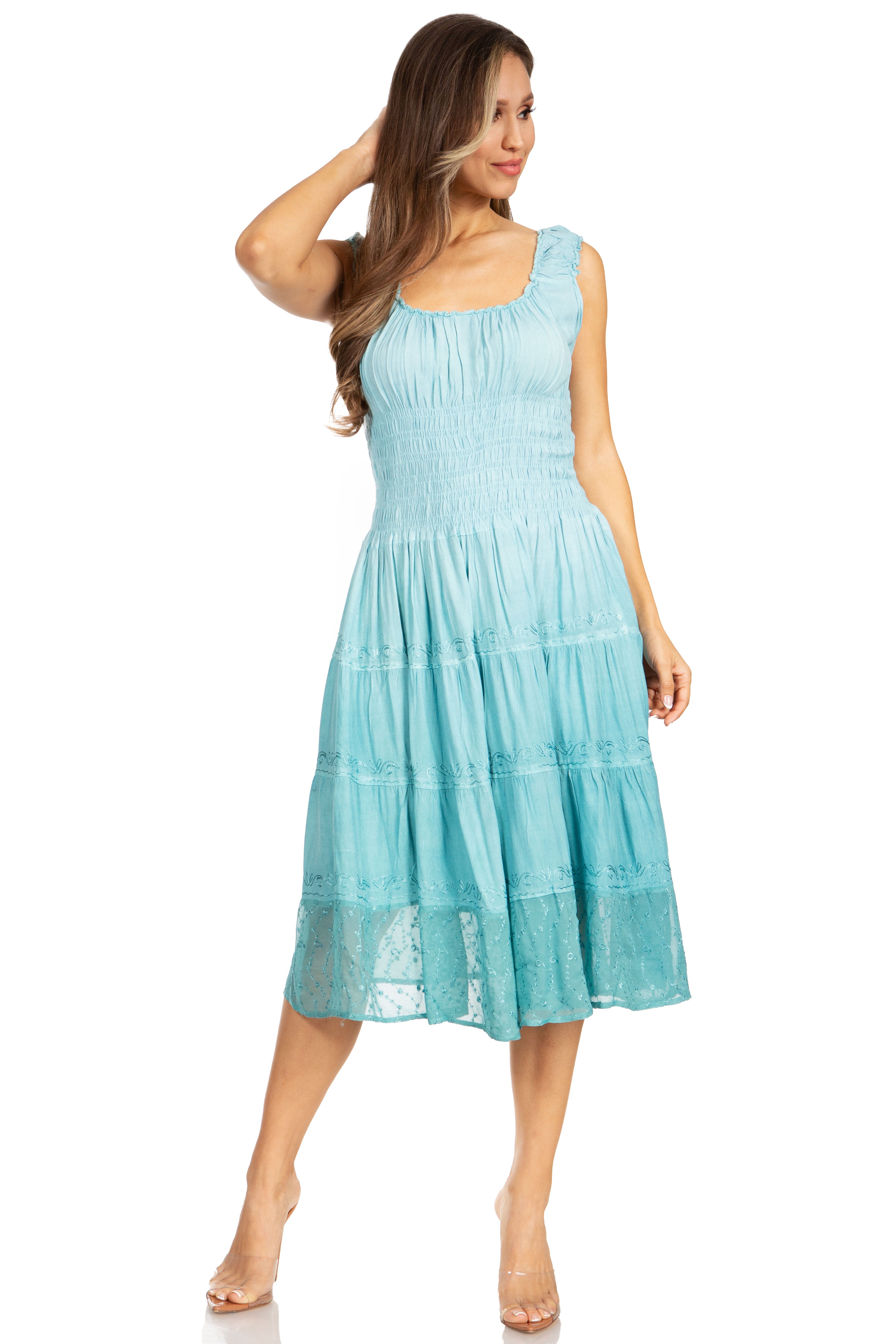 Woman wearing a light blue dress on a white background