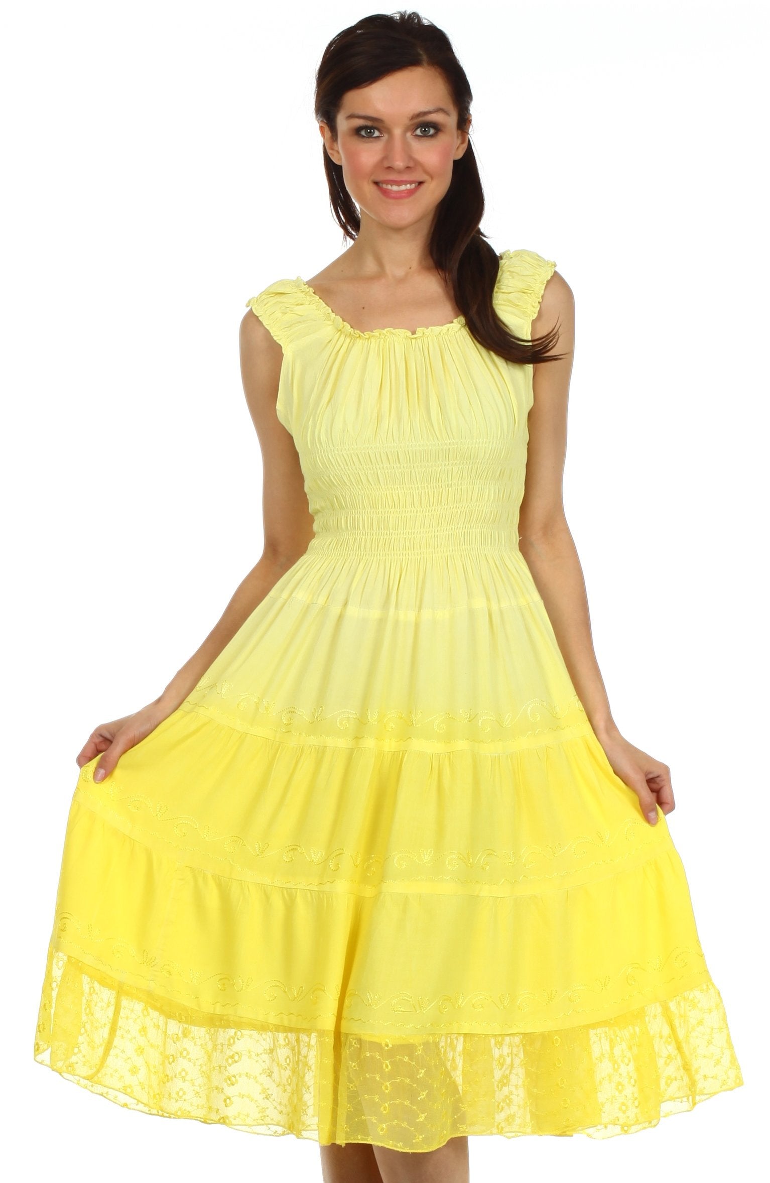 Woman wearing a yellow dress with a white background
