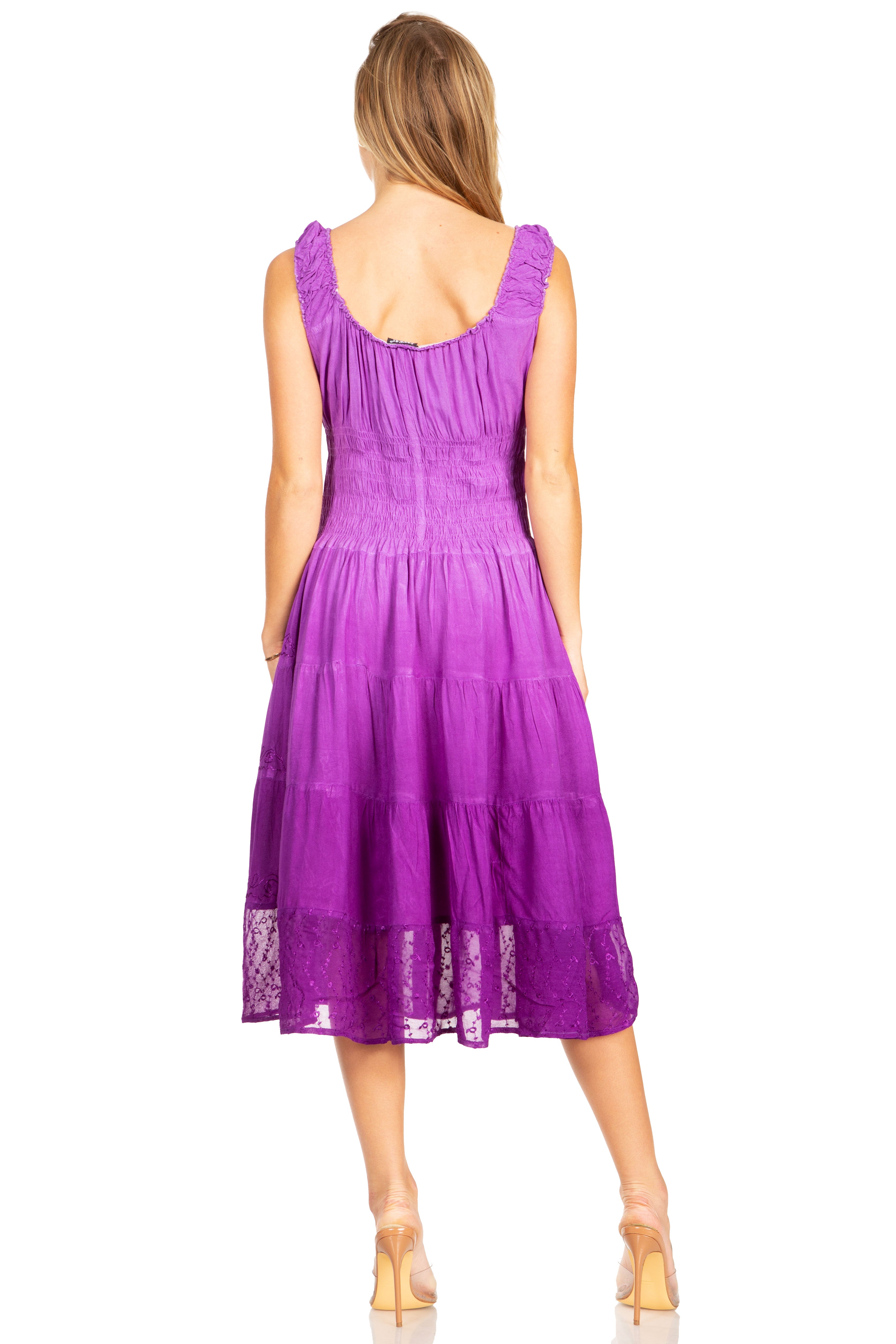 Purple dress worn by a model on a white background