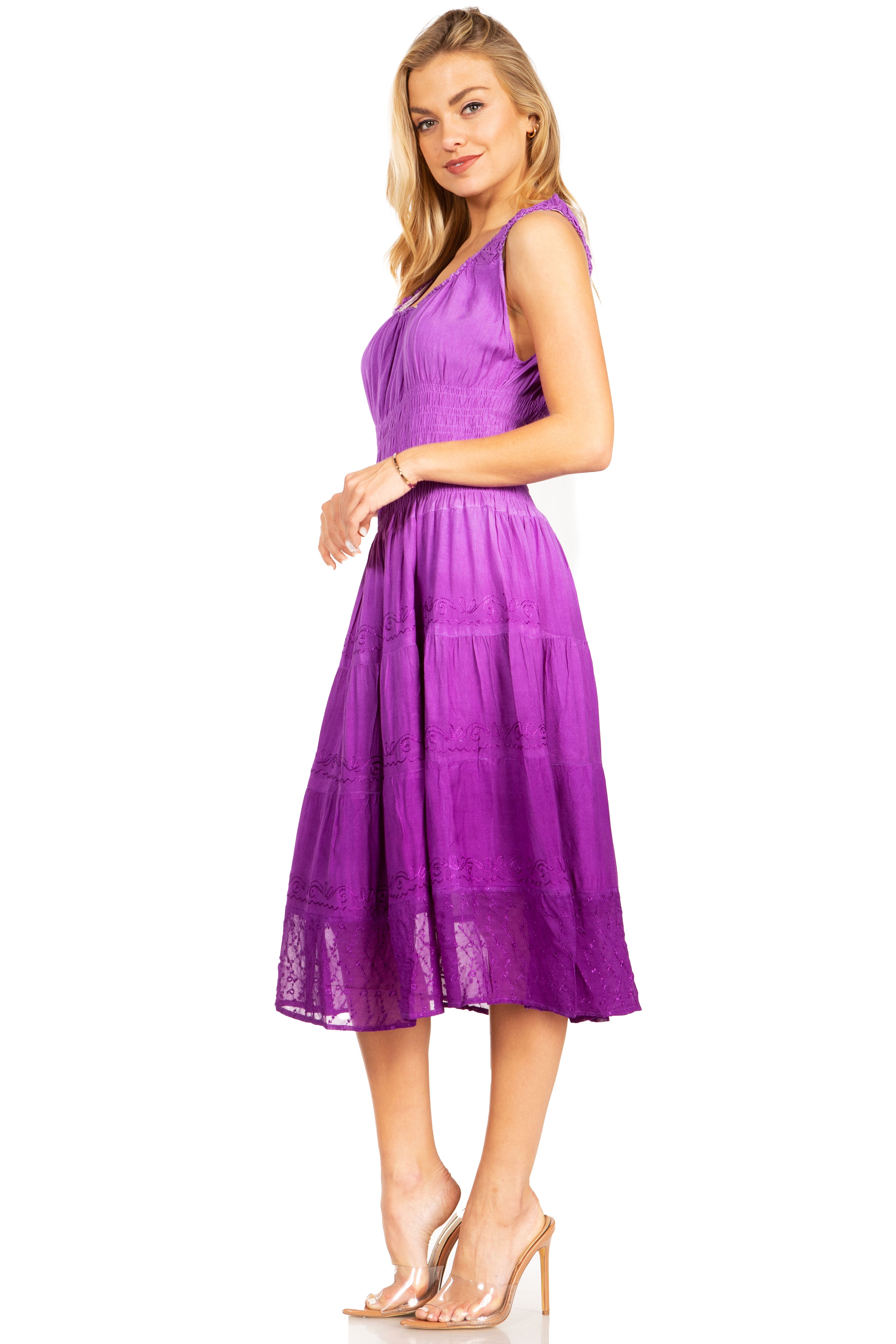 Woman wearing a purple dress on a white background