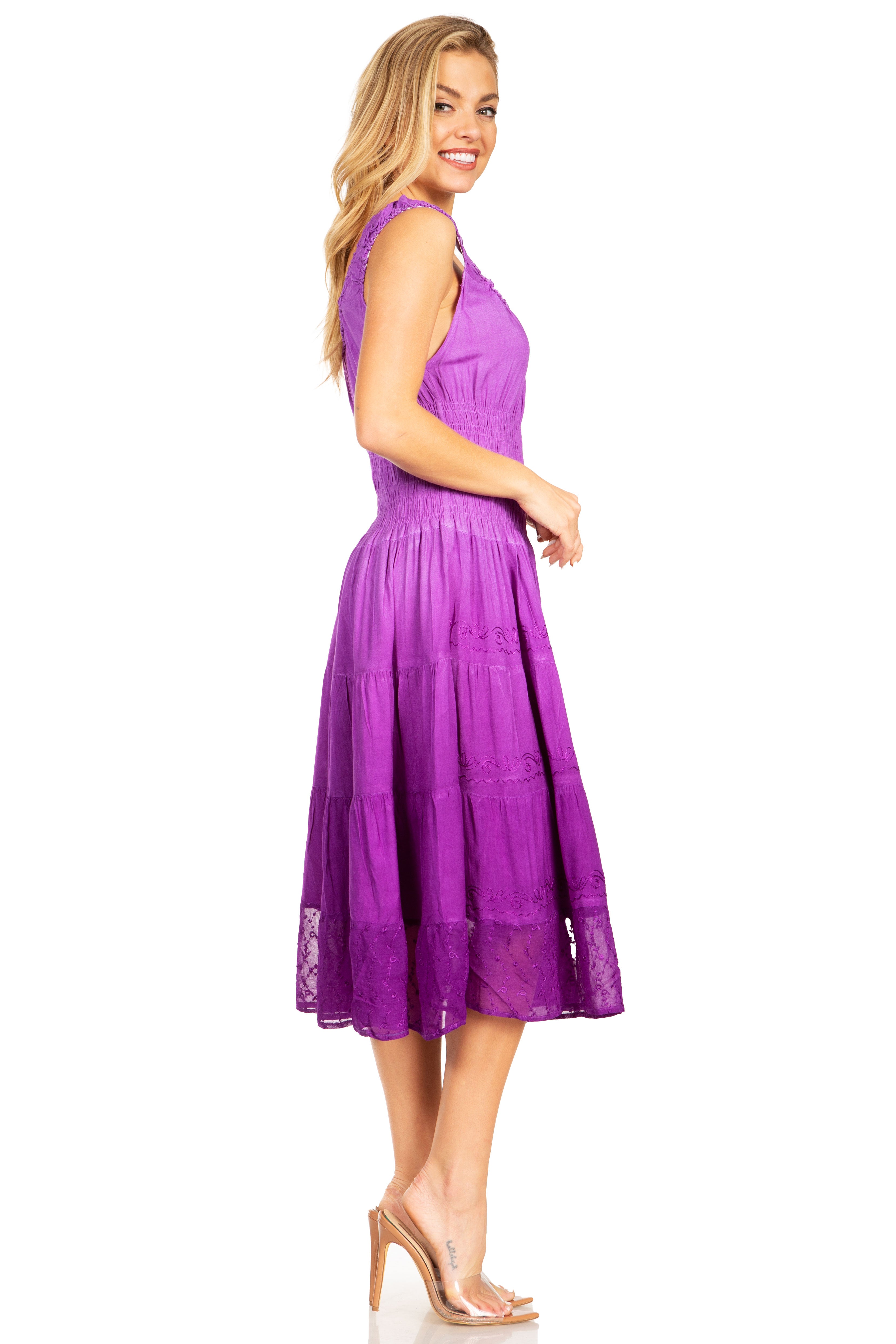 Woman wearing a purple dress on a white background