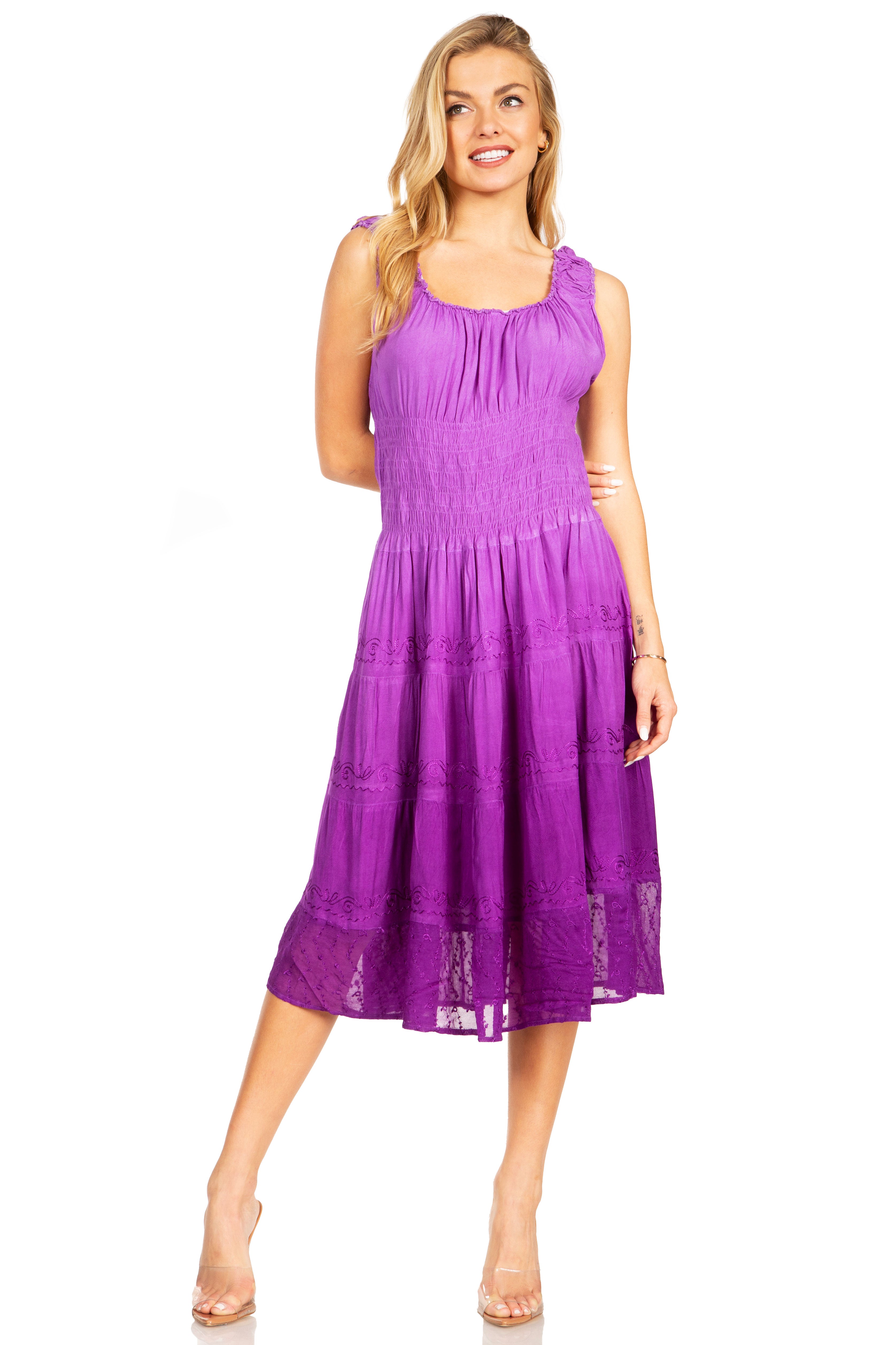 Woman wearing a purple dress on a white background