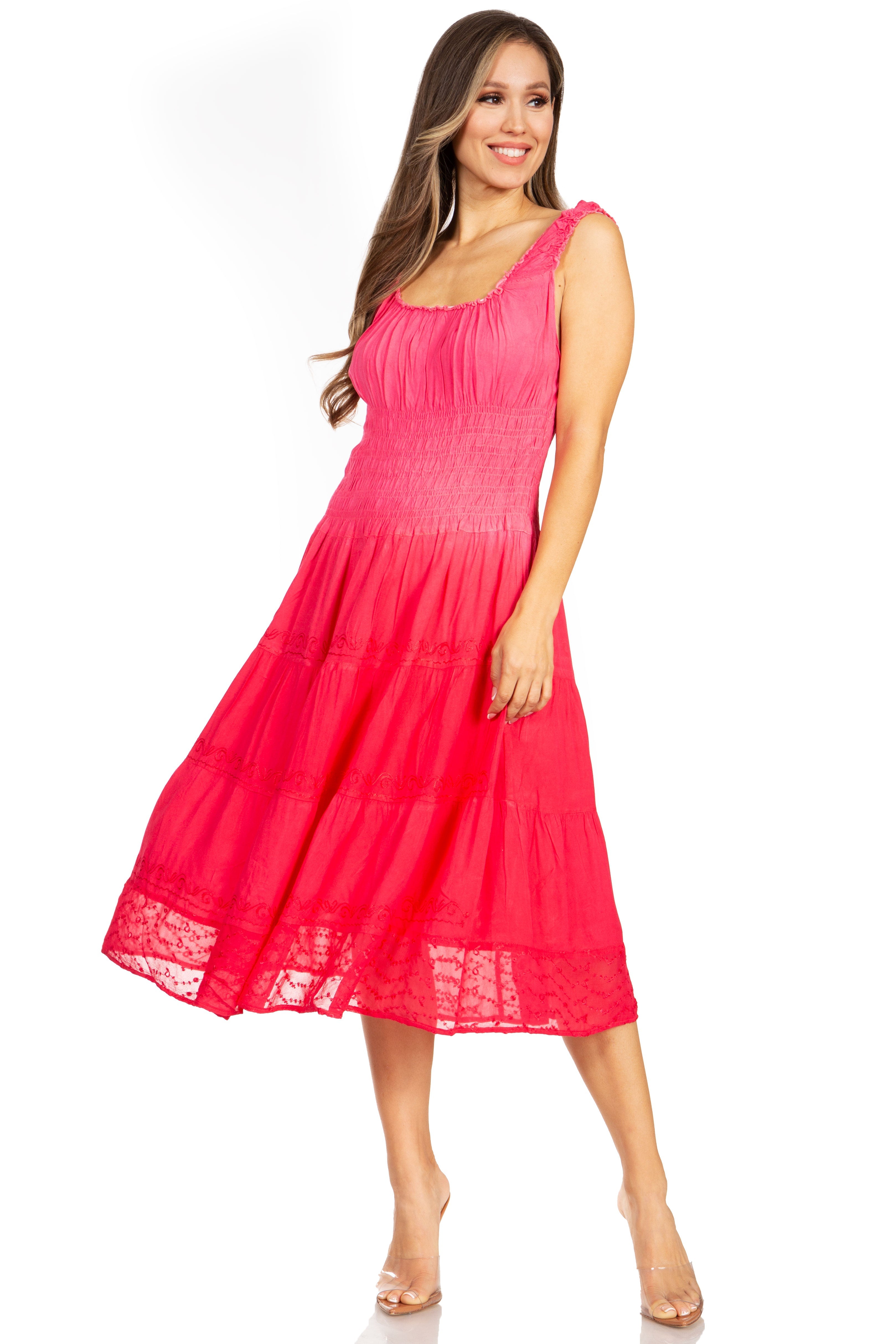 Woman wearing a pink dress on a white background