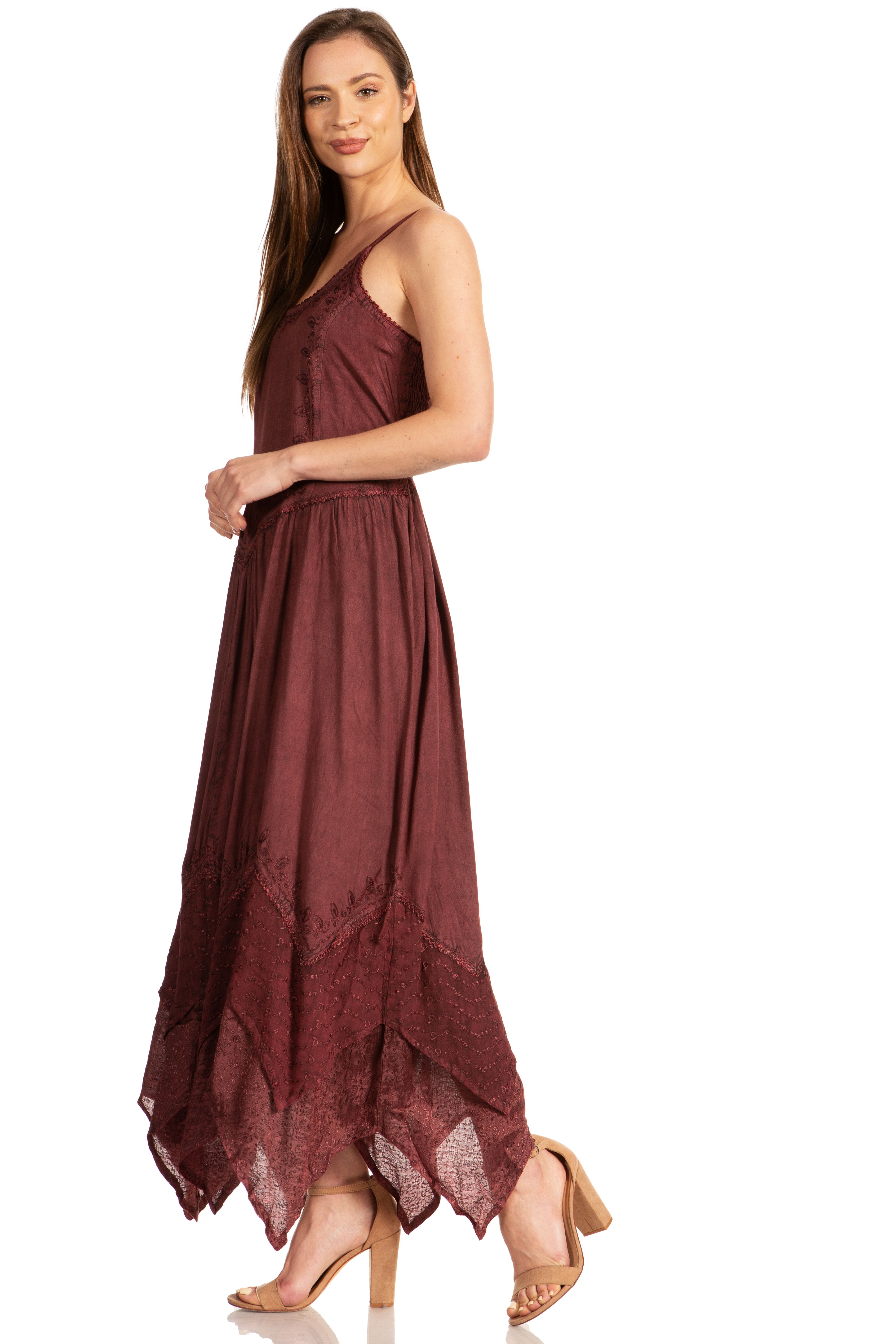 Woman wearing a burgundy dress on a white background