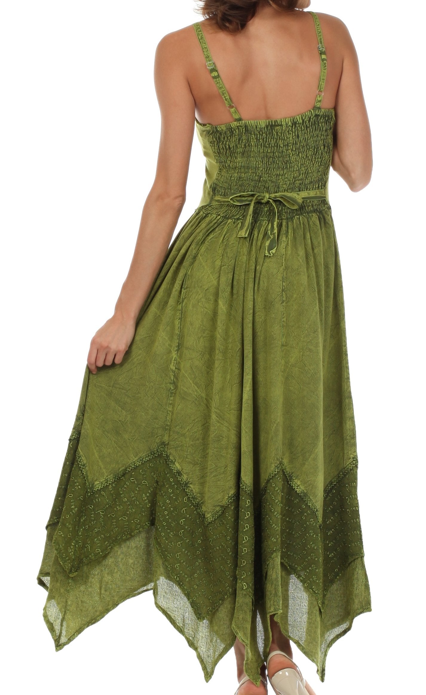 Green dress with a smocked waist and layered skirt on a white background