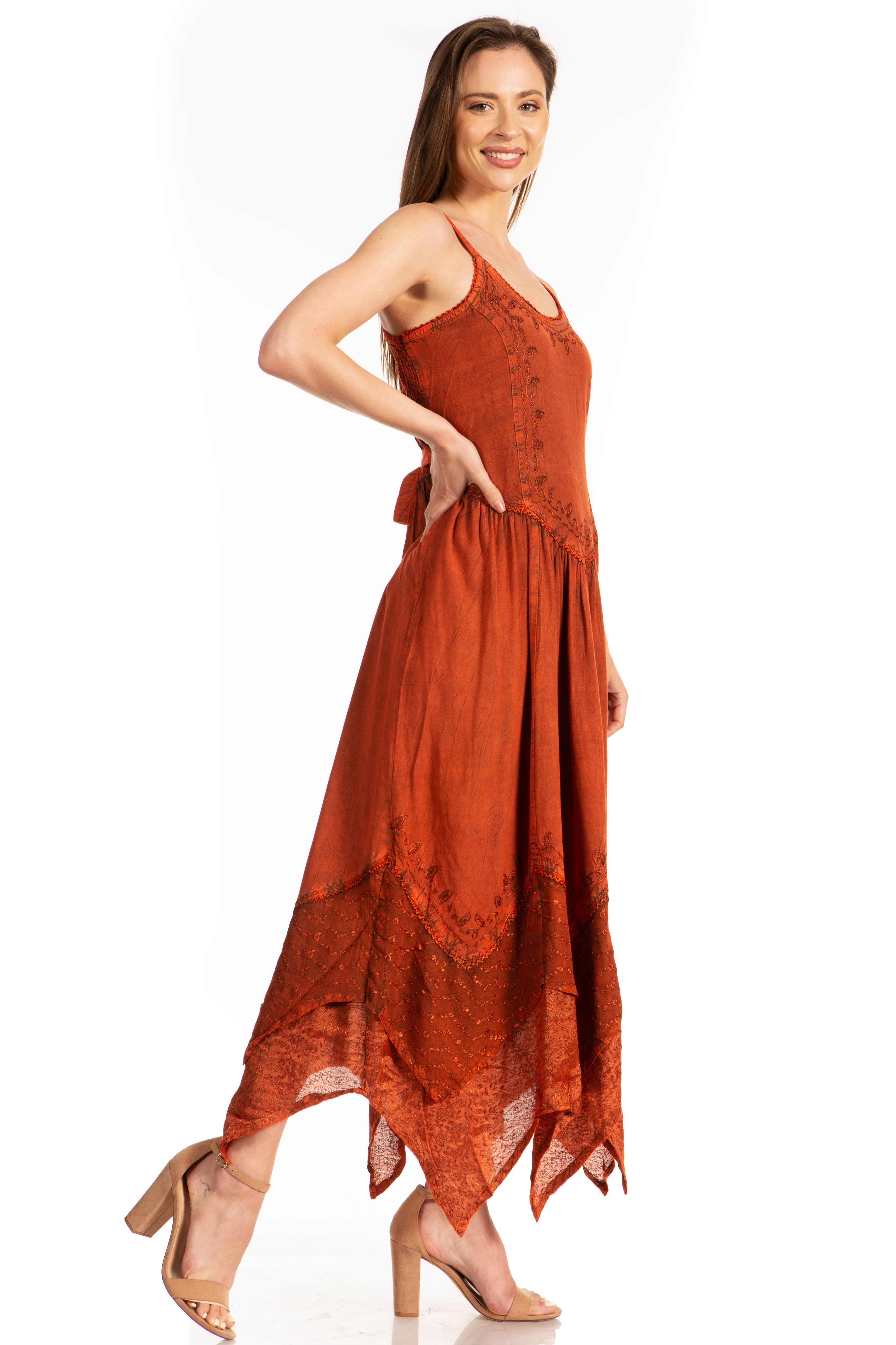 Woman wearing a rust-colored dress on a white background