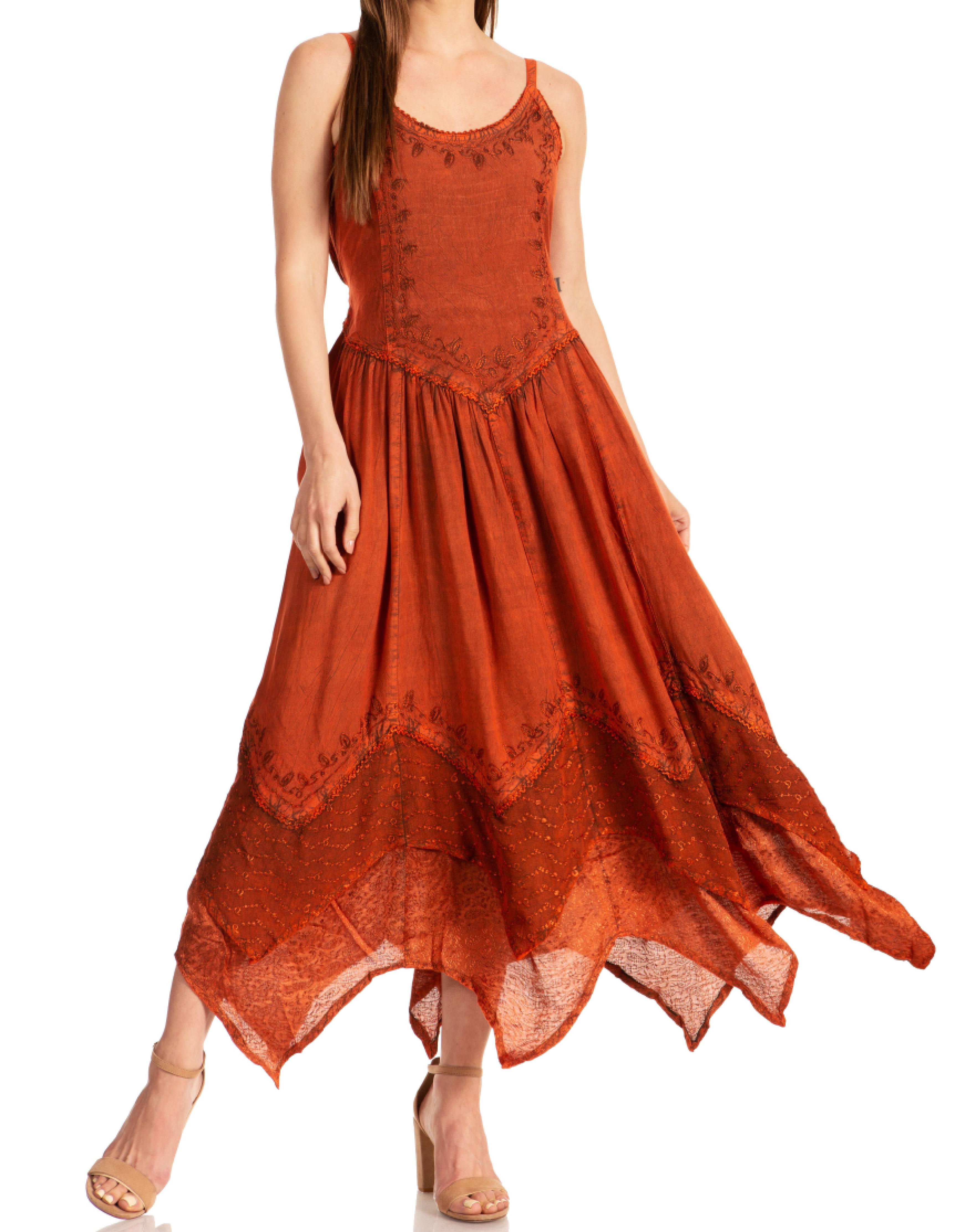 Woman wearing a rust-colored dress with lace details on a white background