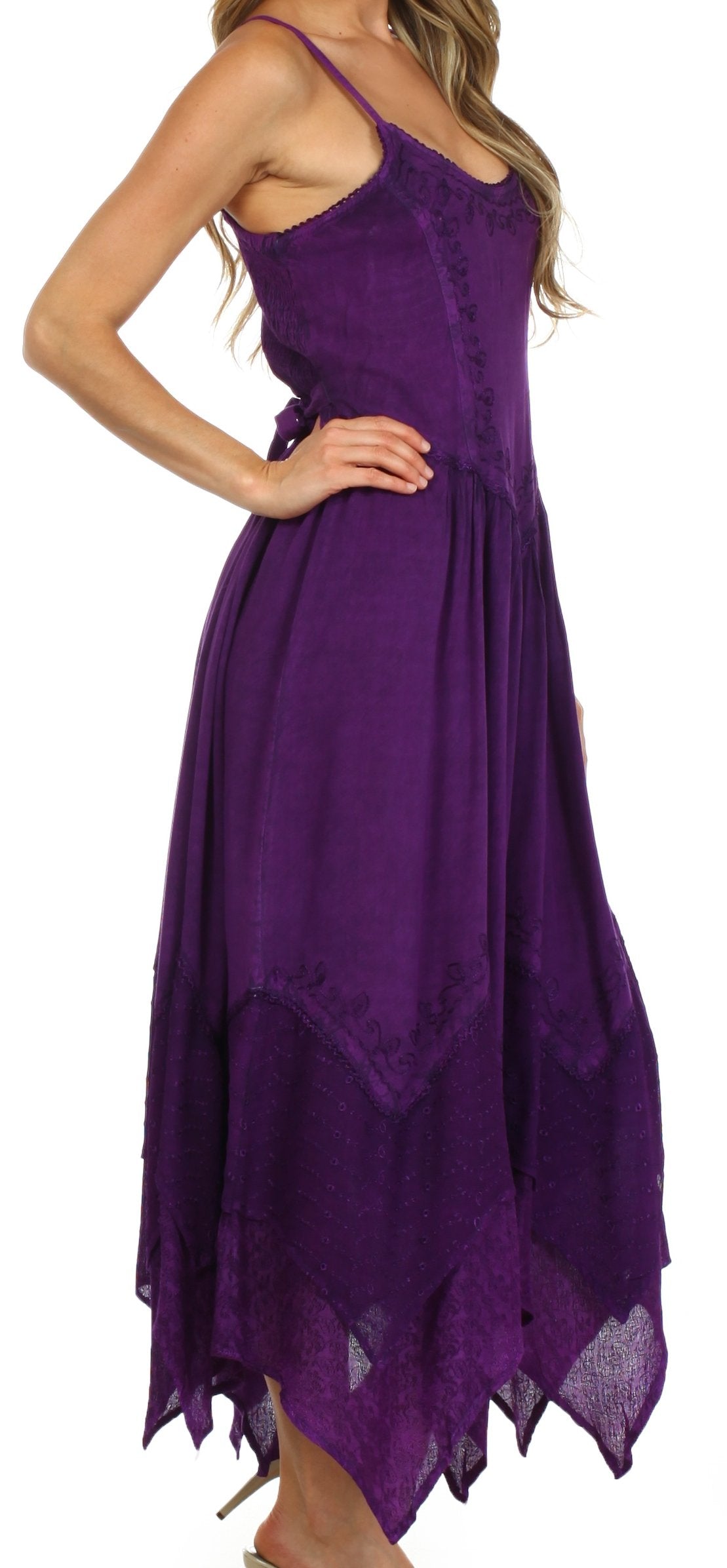 Purple dress with a unique hem design on a white background