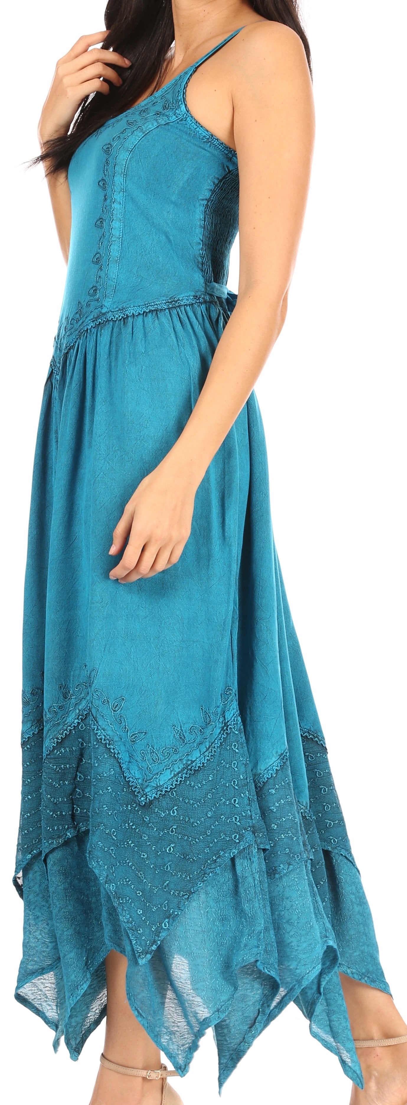 Woman wearing a blue dress with a white background