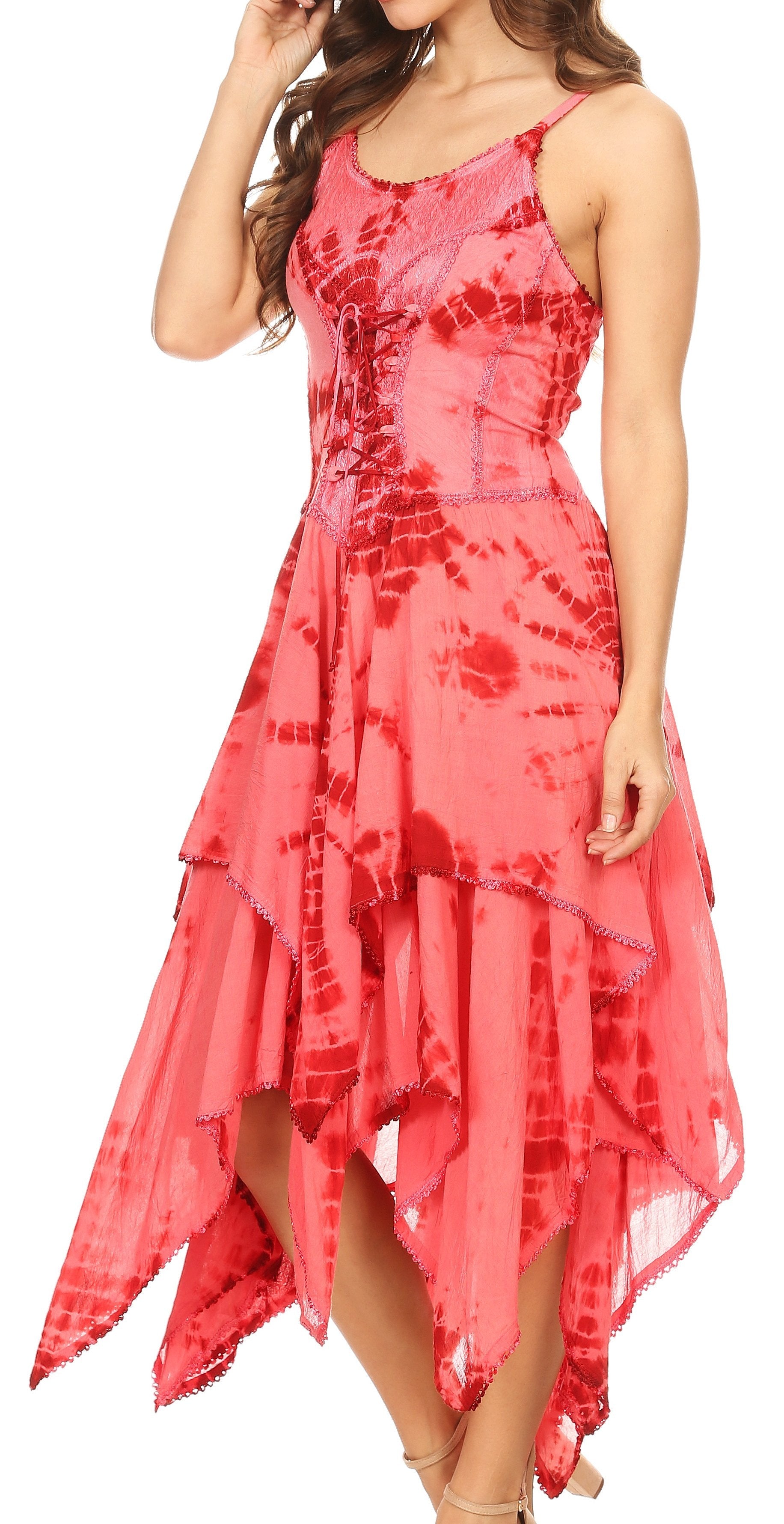 Woman wearing a pink tie-dye dress on a white background
