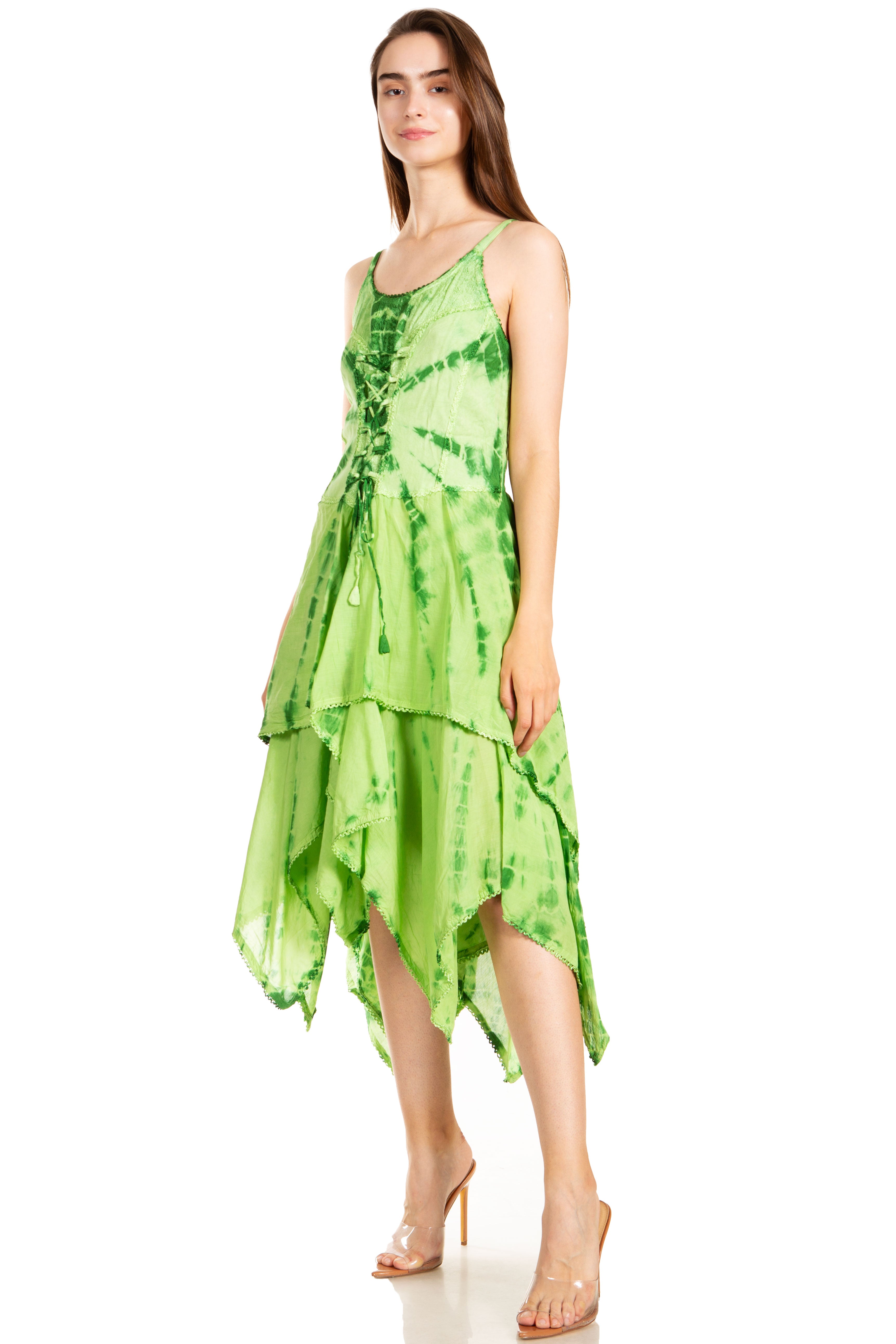 Woman wearing a green tie-dye dress on a white background