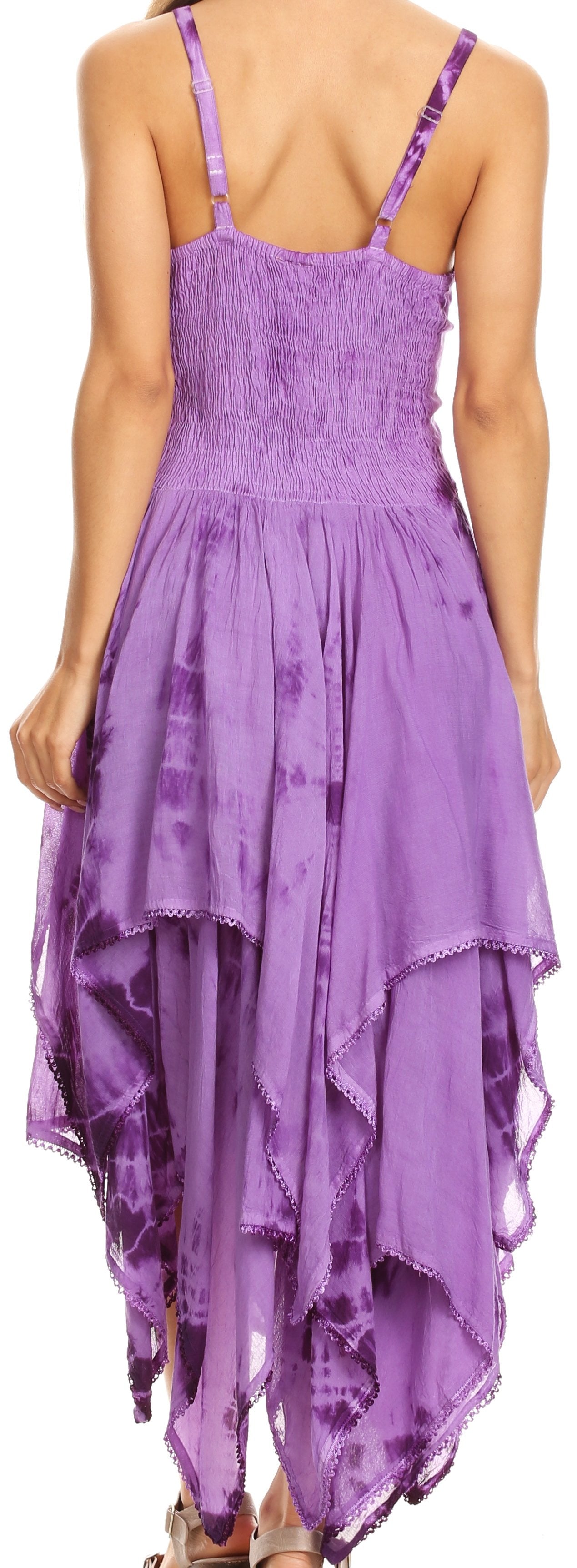 Purple dress with a smocked bodice and flowing skirt on a white background