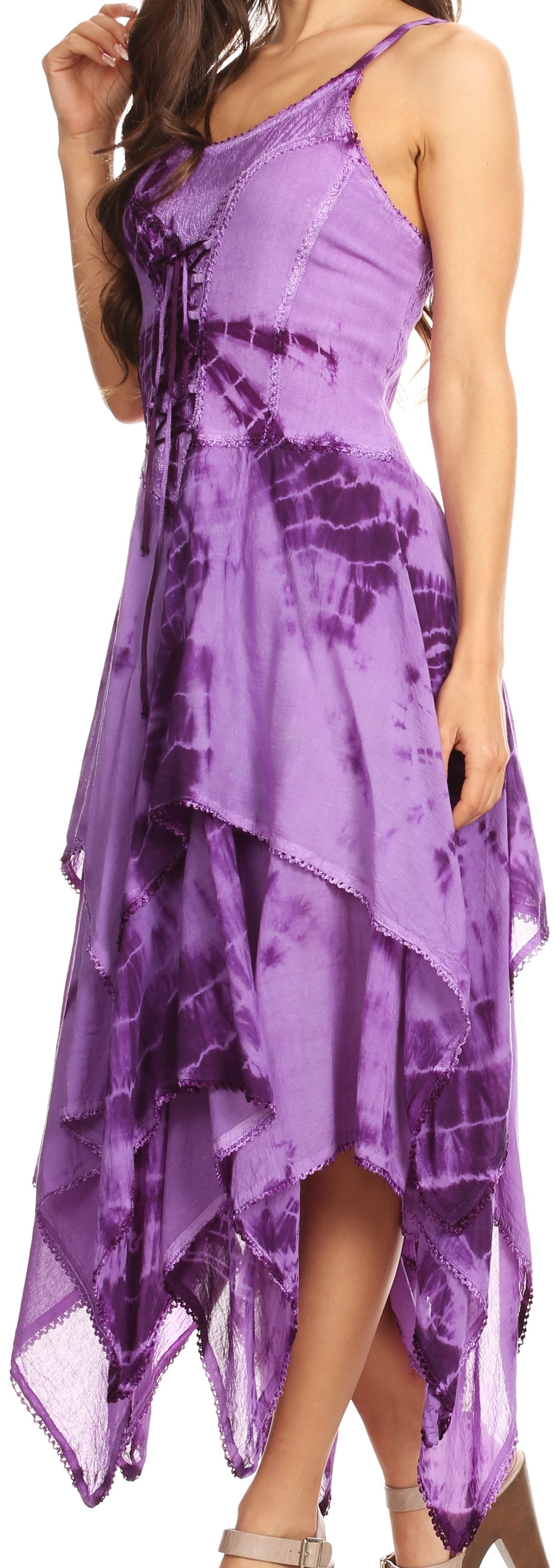 Woman wearing a purple tie-dye dress with a flowing design.