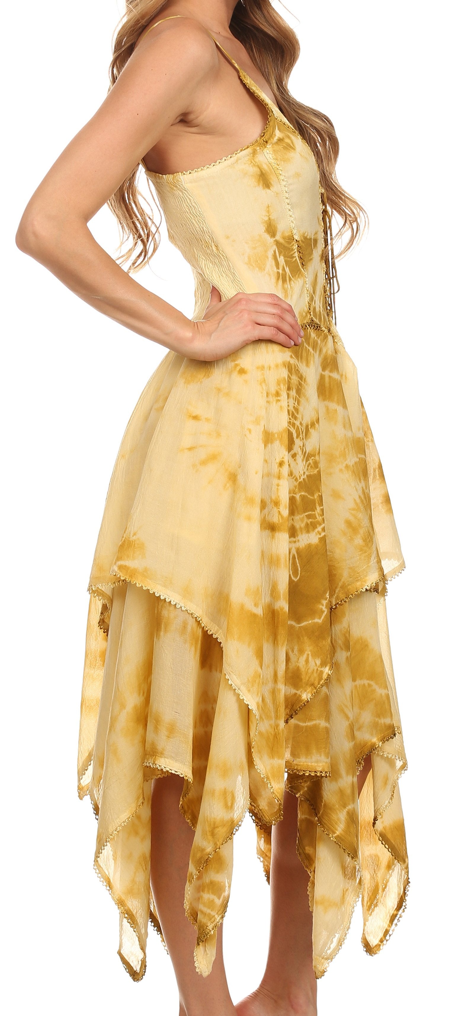 Woman wearing a yellow tie-dye dress on a white background