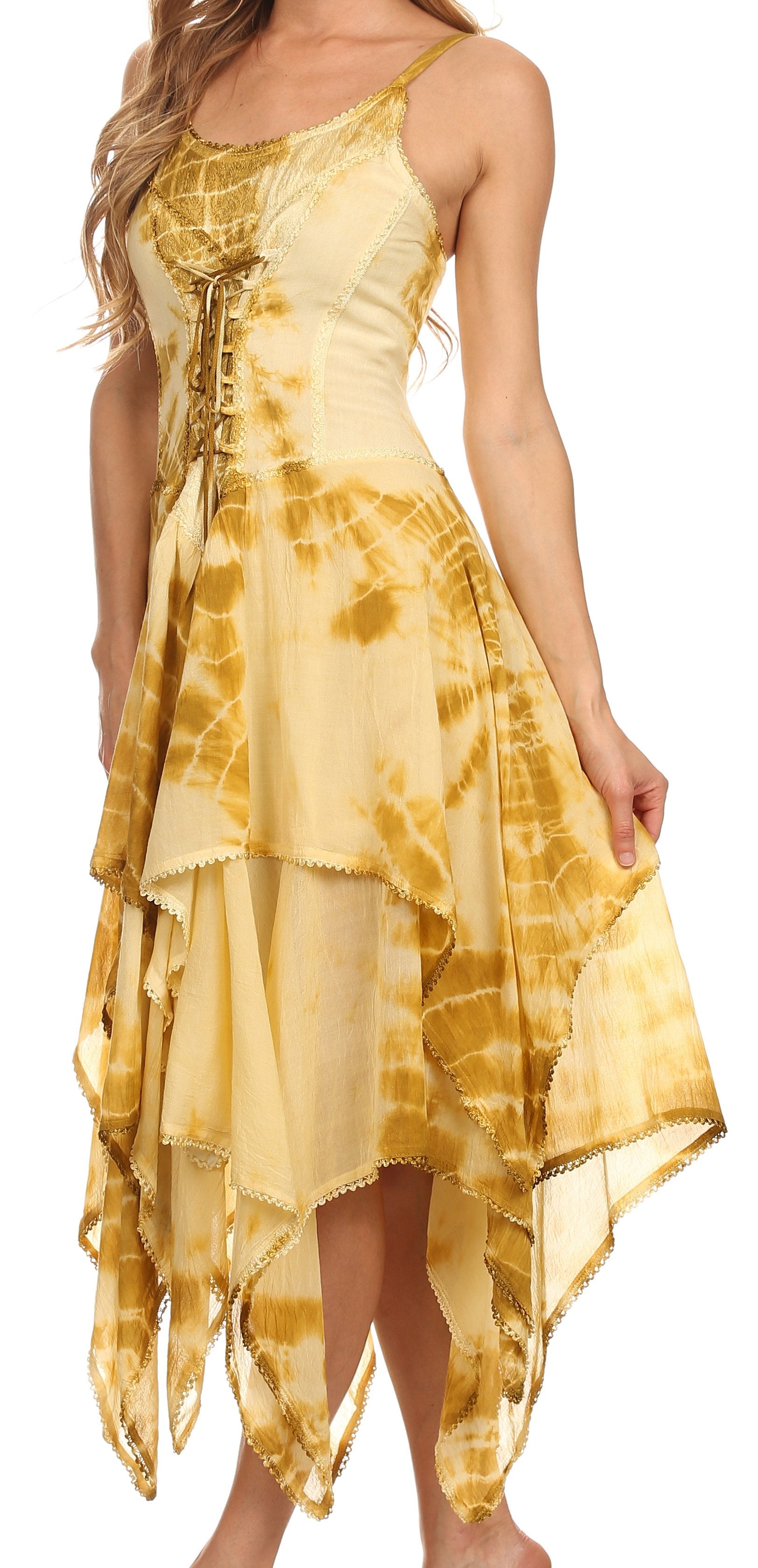 Woman wearing a yellow tie-dye dress with a white background
