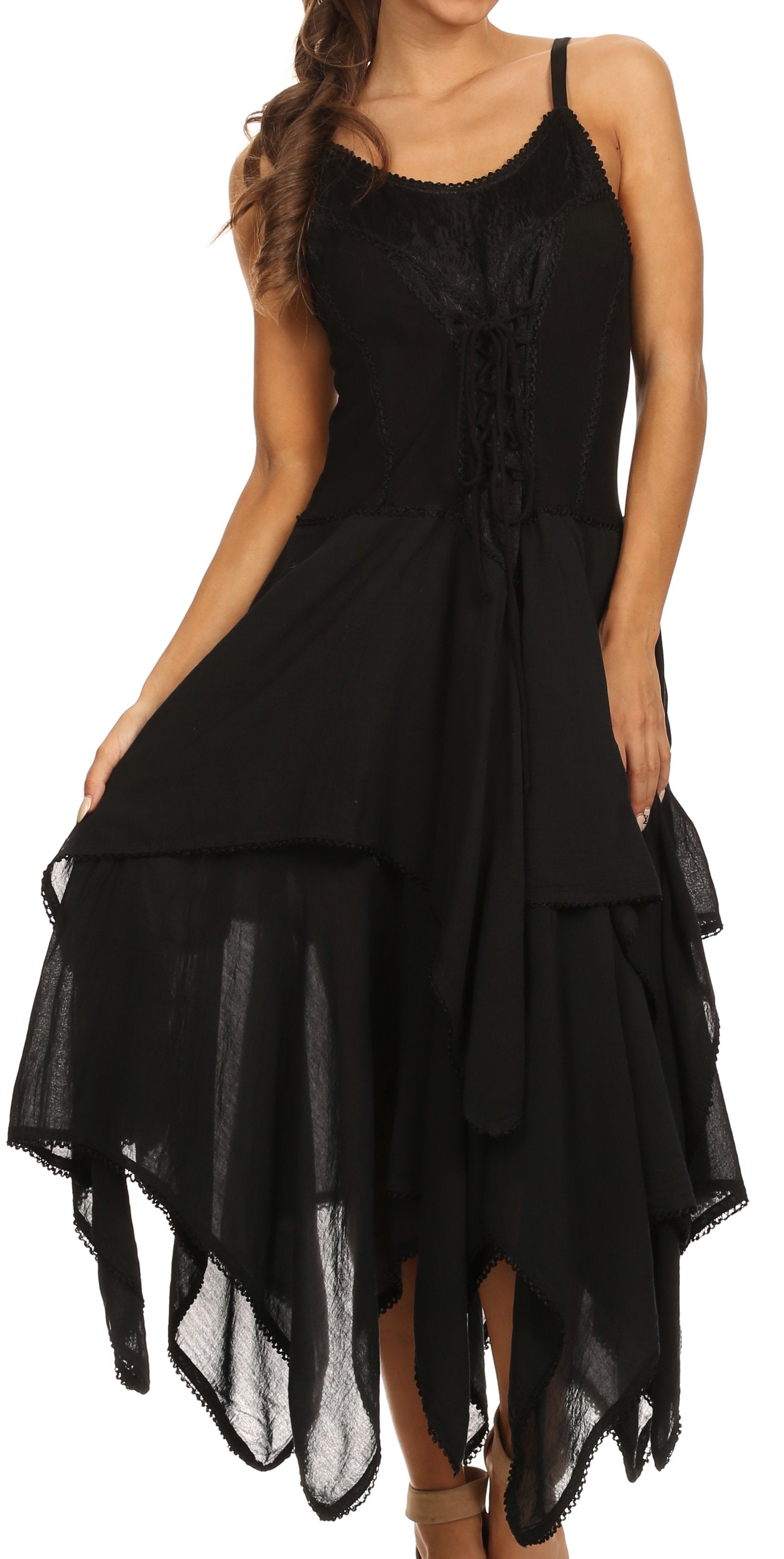 Black layered dress worn by a model on a white background