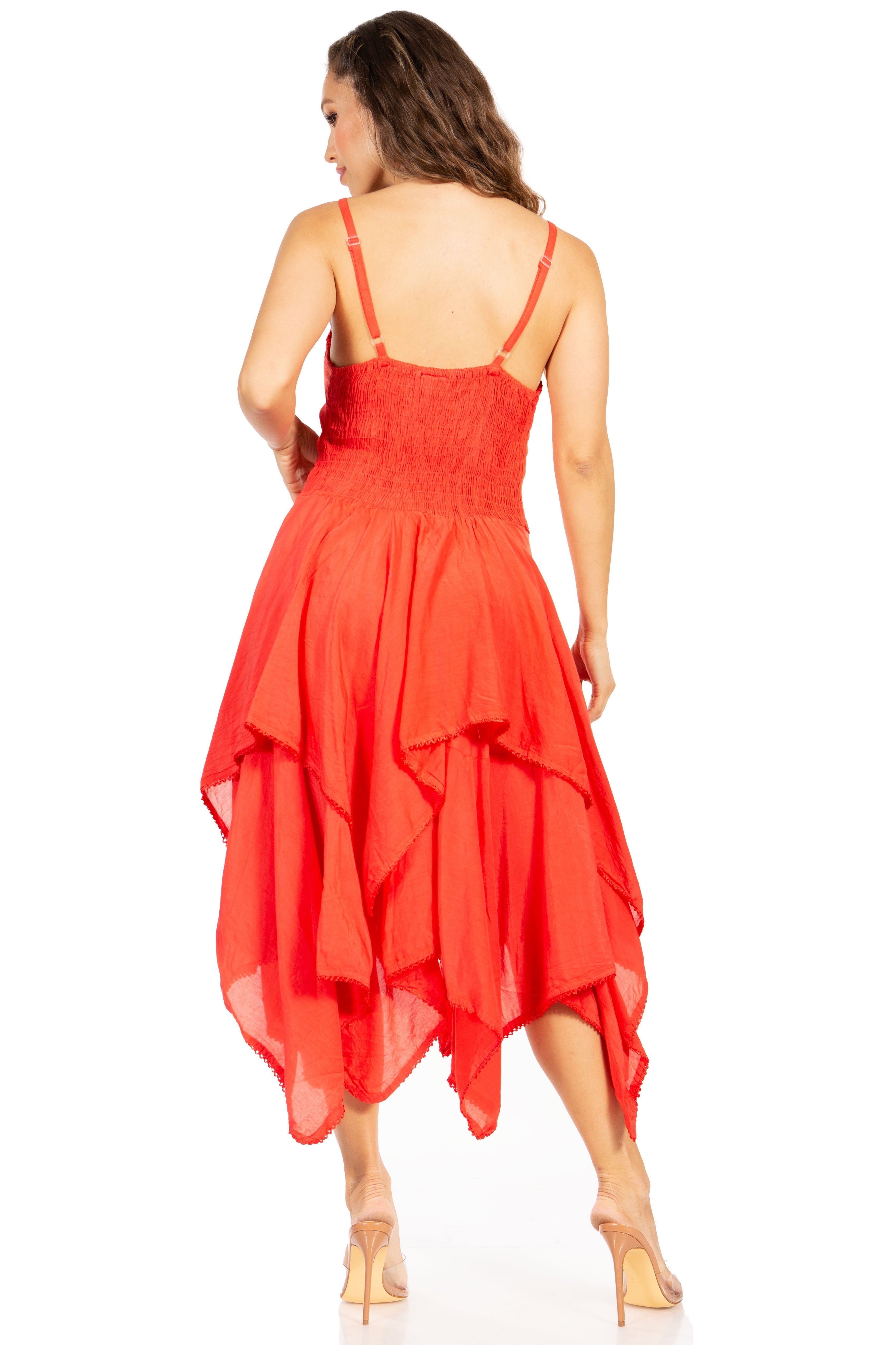 Woman wearing a red dress with a white background