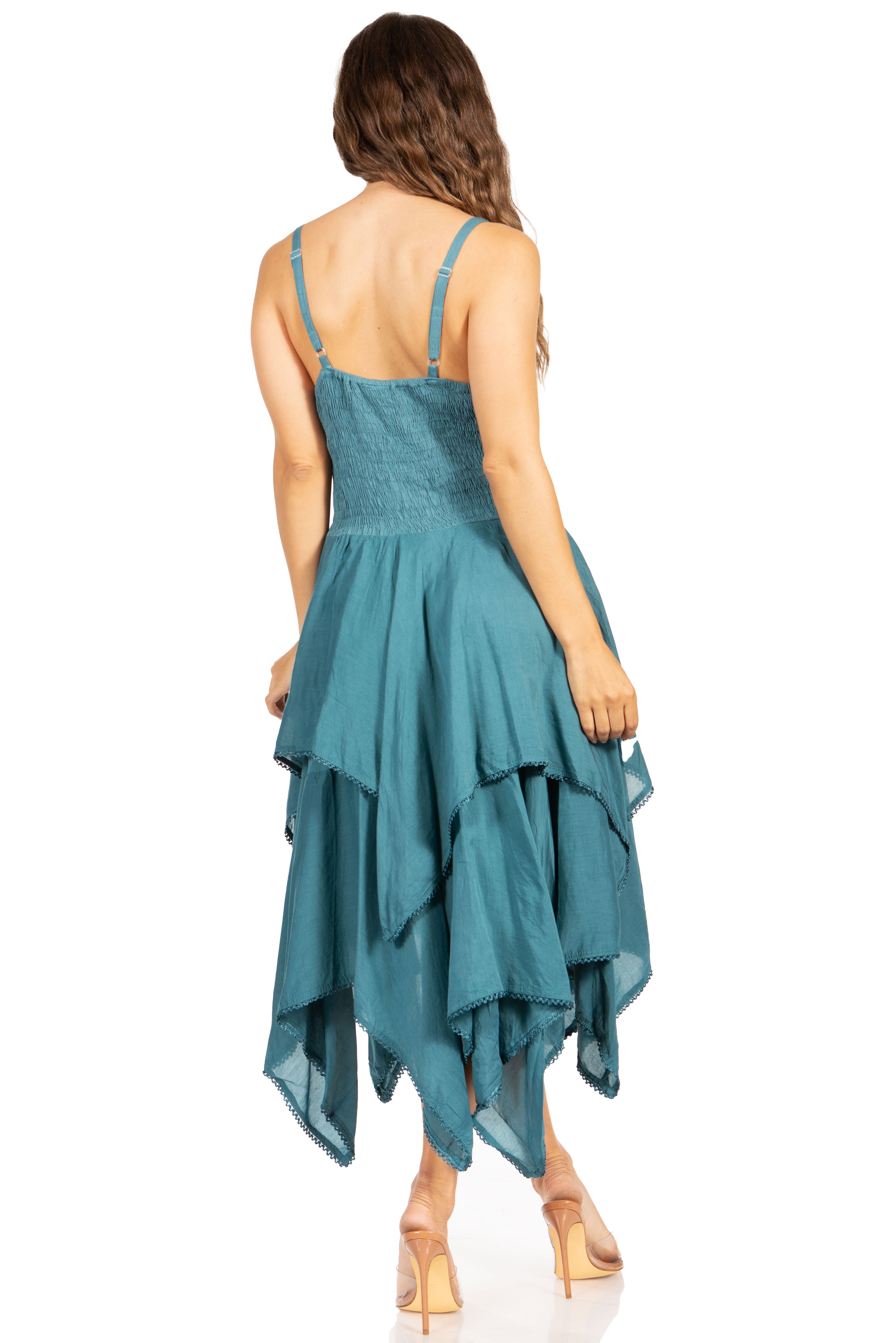 Teal dress with ruffled layers on a white background