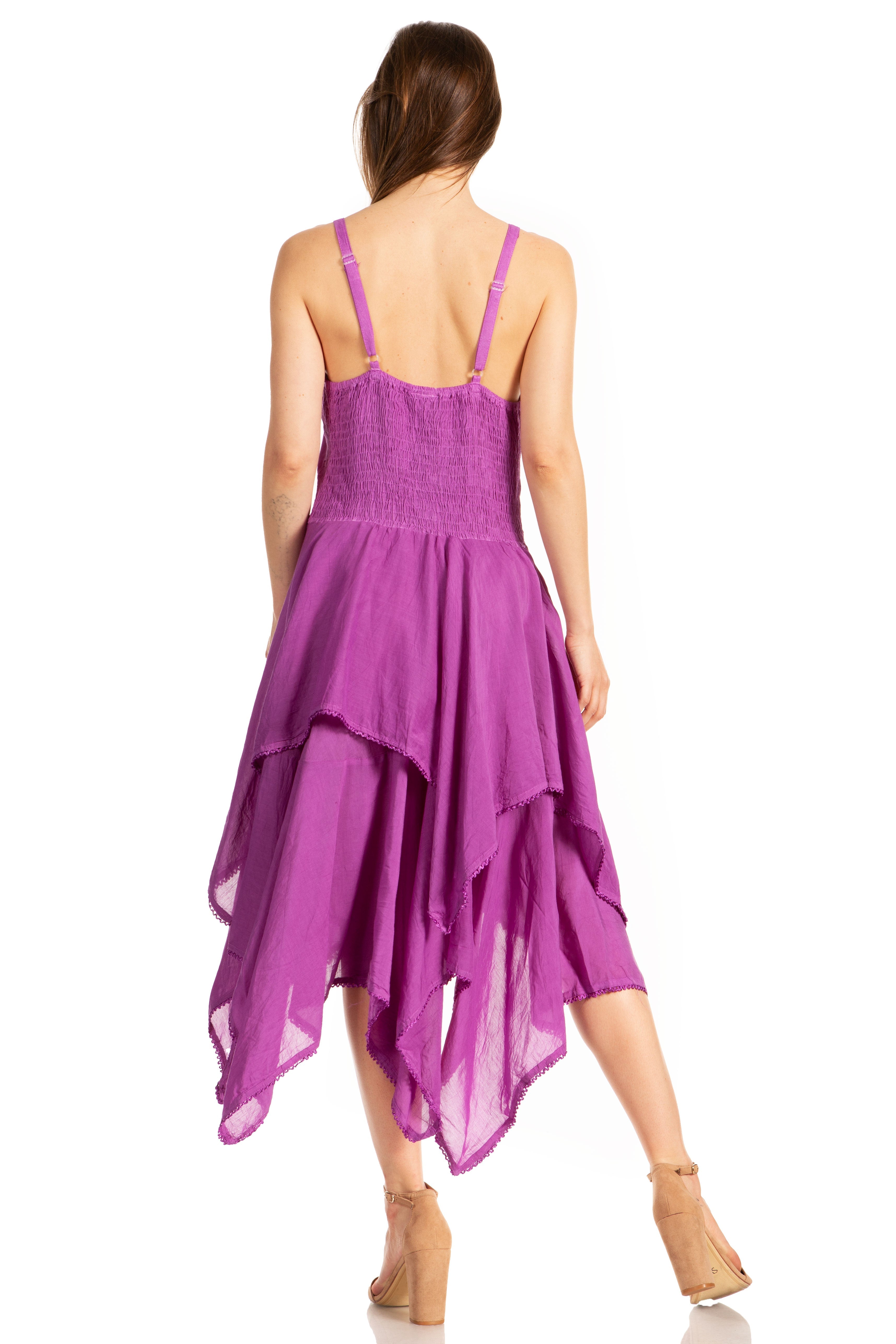 Woman wearing a purple dress with a white background