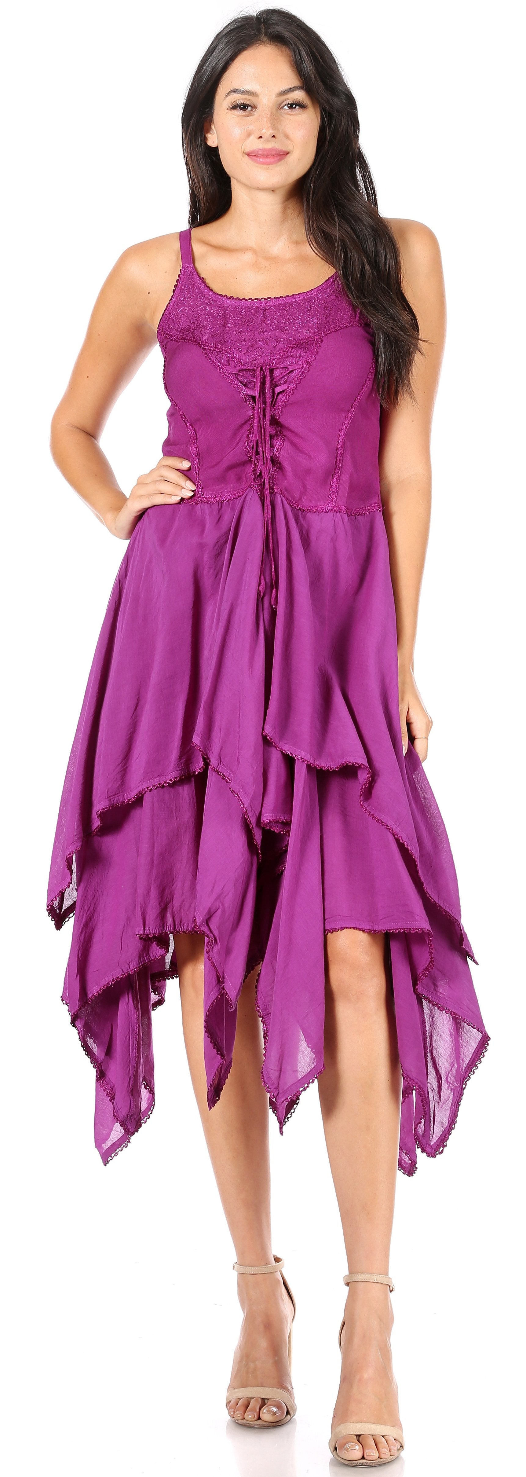 Woman wearing a purple dress with a white background