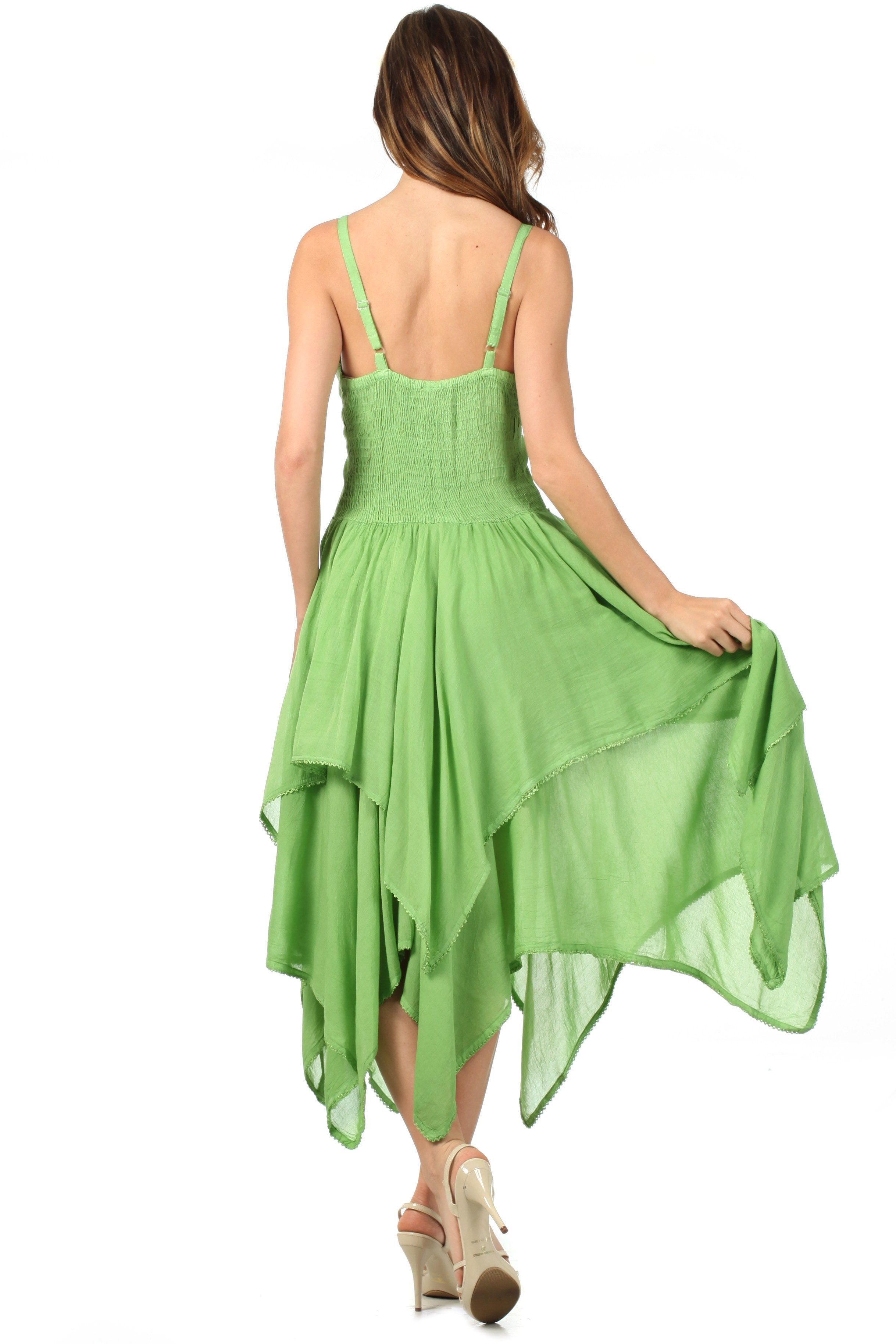 Green dress with a backless design on a white background