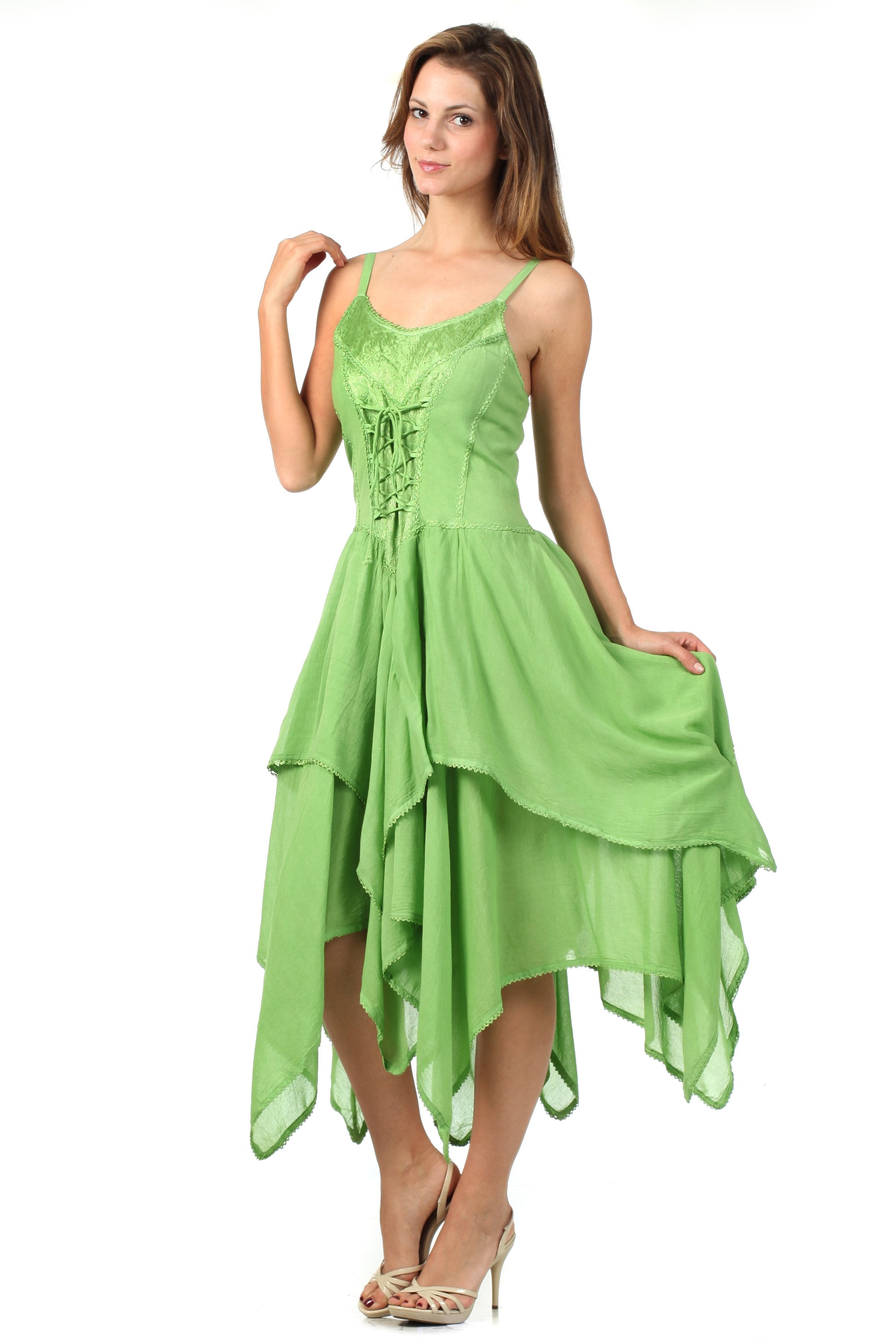 Woman wearing a green dress on a white background