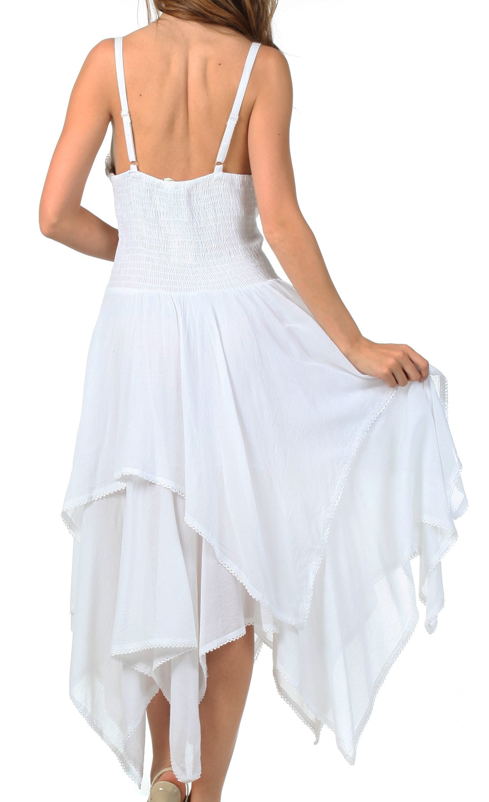 White dress with an open back and high-low hem on a white background