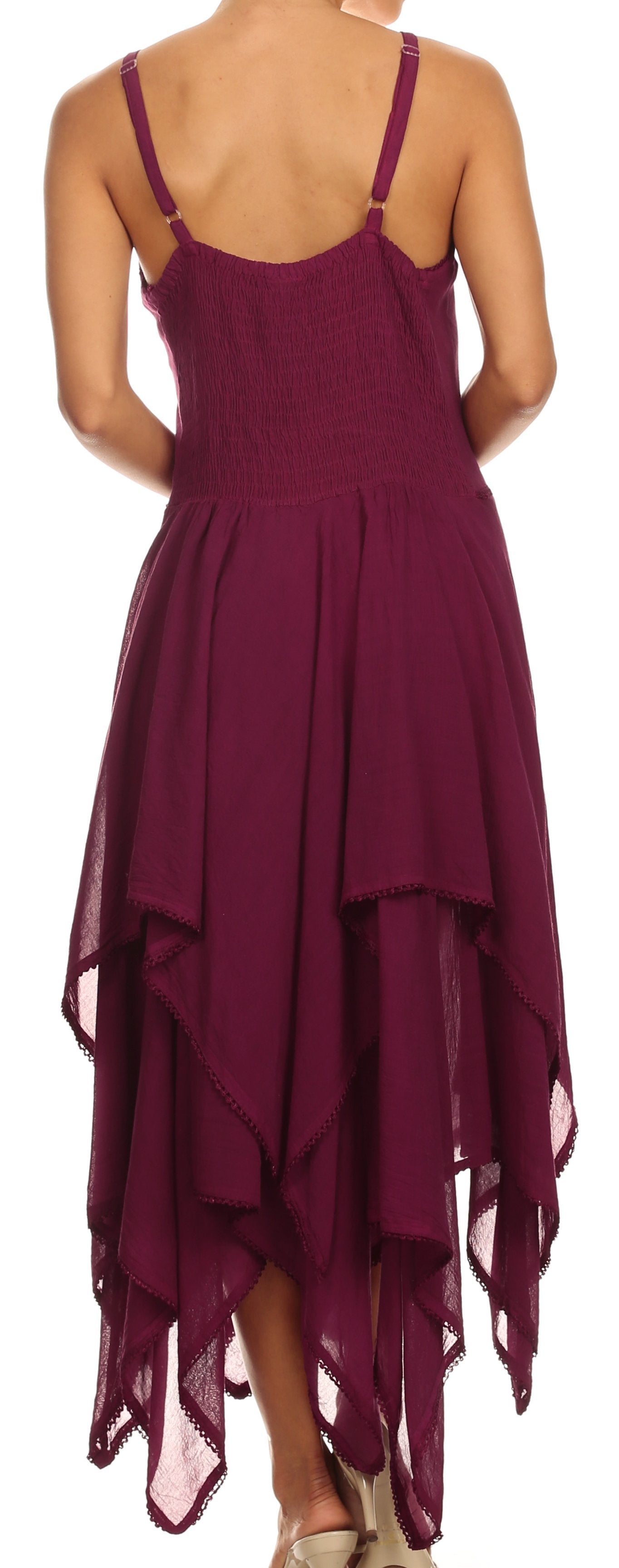 Purple dress with a high-low hemline on a white background