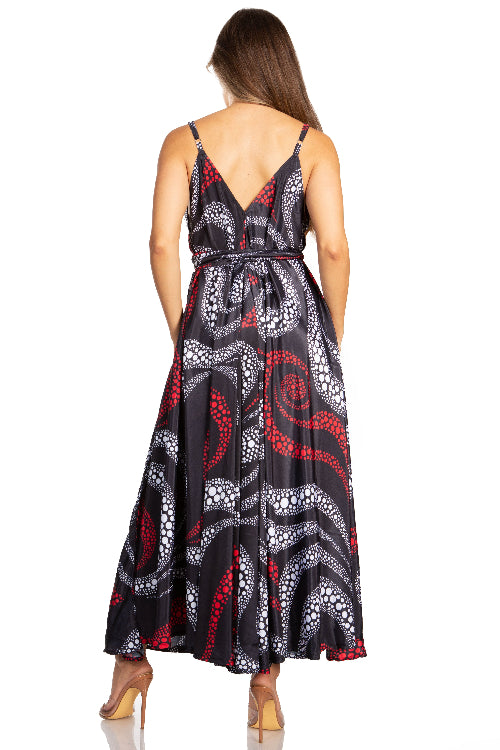 Woman wearing a patterned dress with a white background