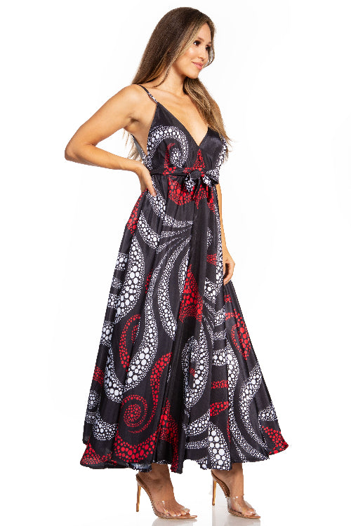Woman wearing a patterned dress on a white background