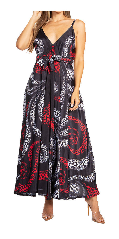 Woman wearing a black patterned dress on a white background
