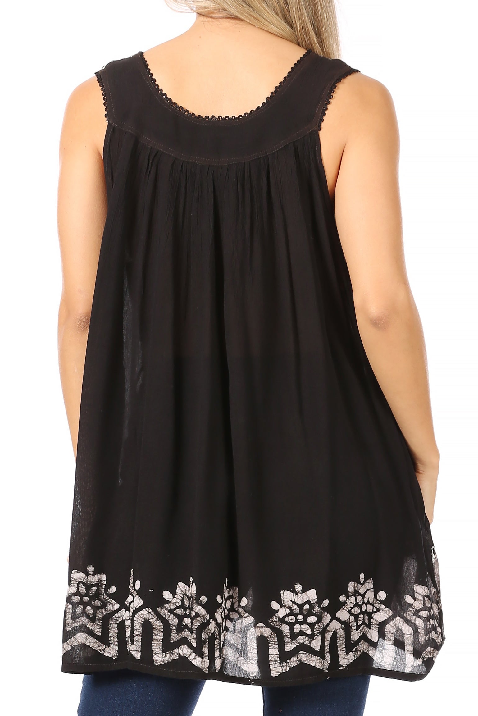 Black sleeveless top with white floral embroidery on a white background