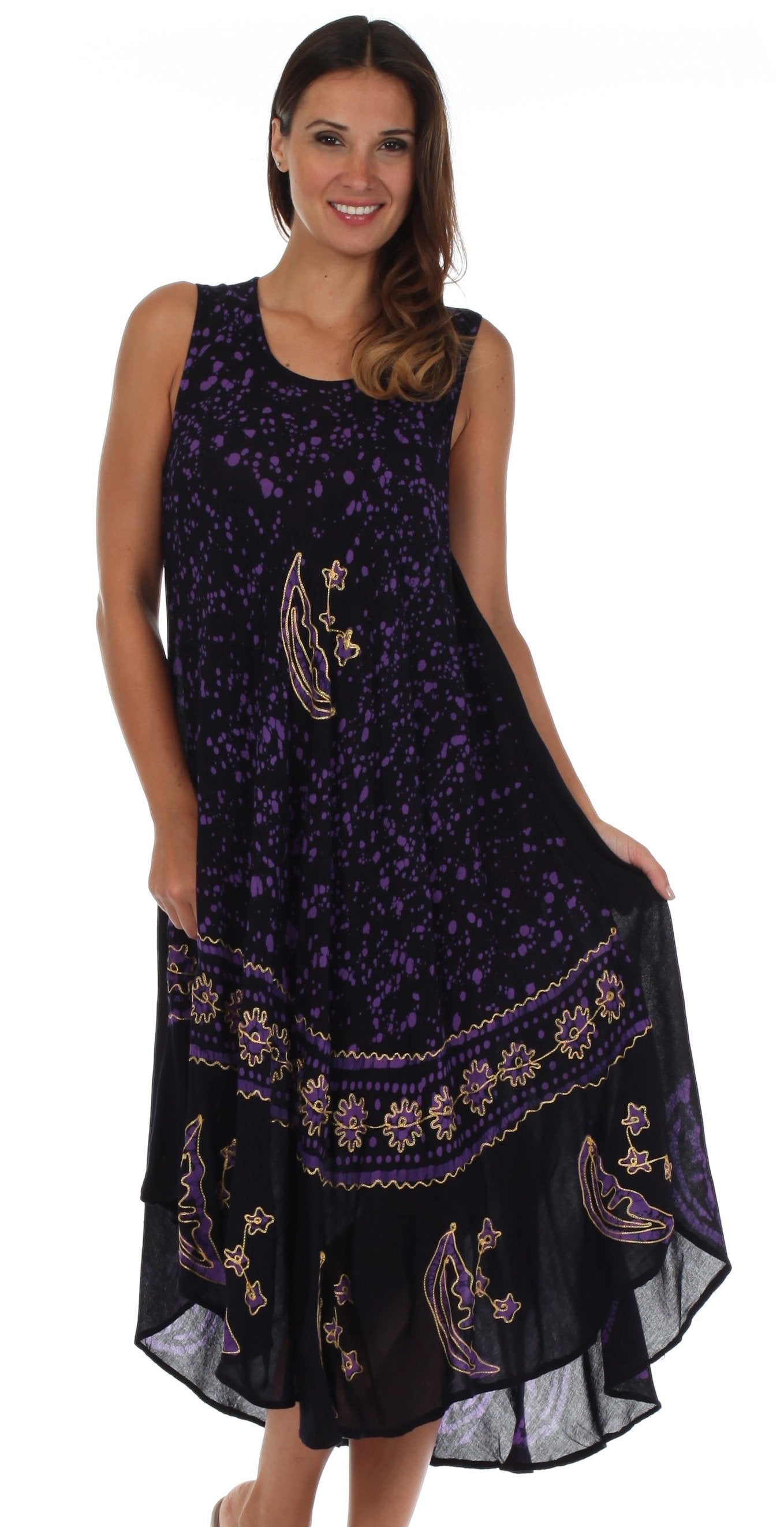 Woman wearing a black dress with purple floral patterns on a white background