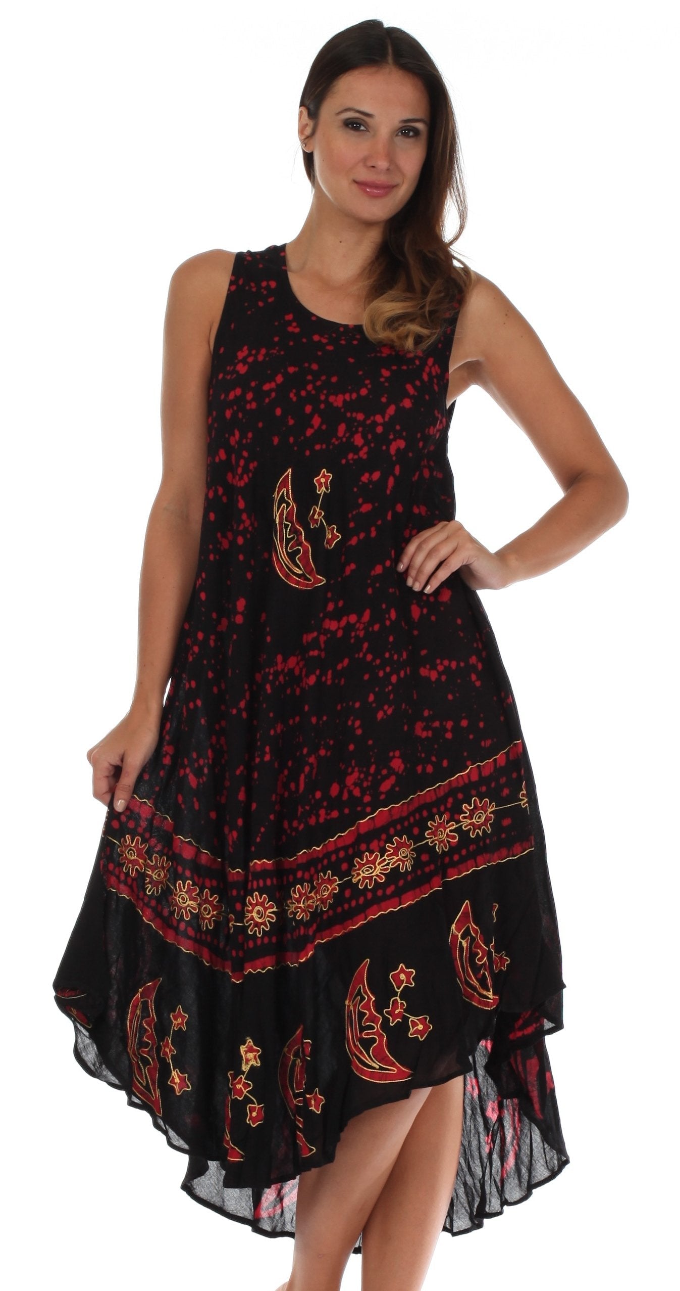 Woman wearing a black dress with red floral patterns on a white background
