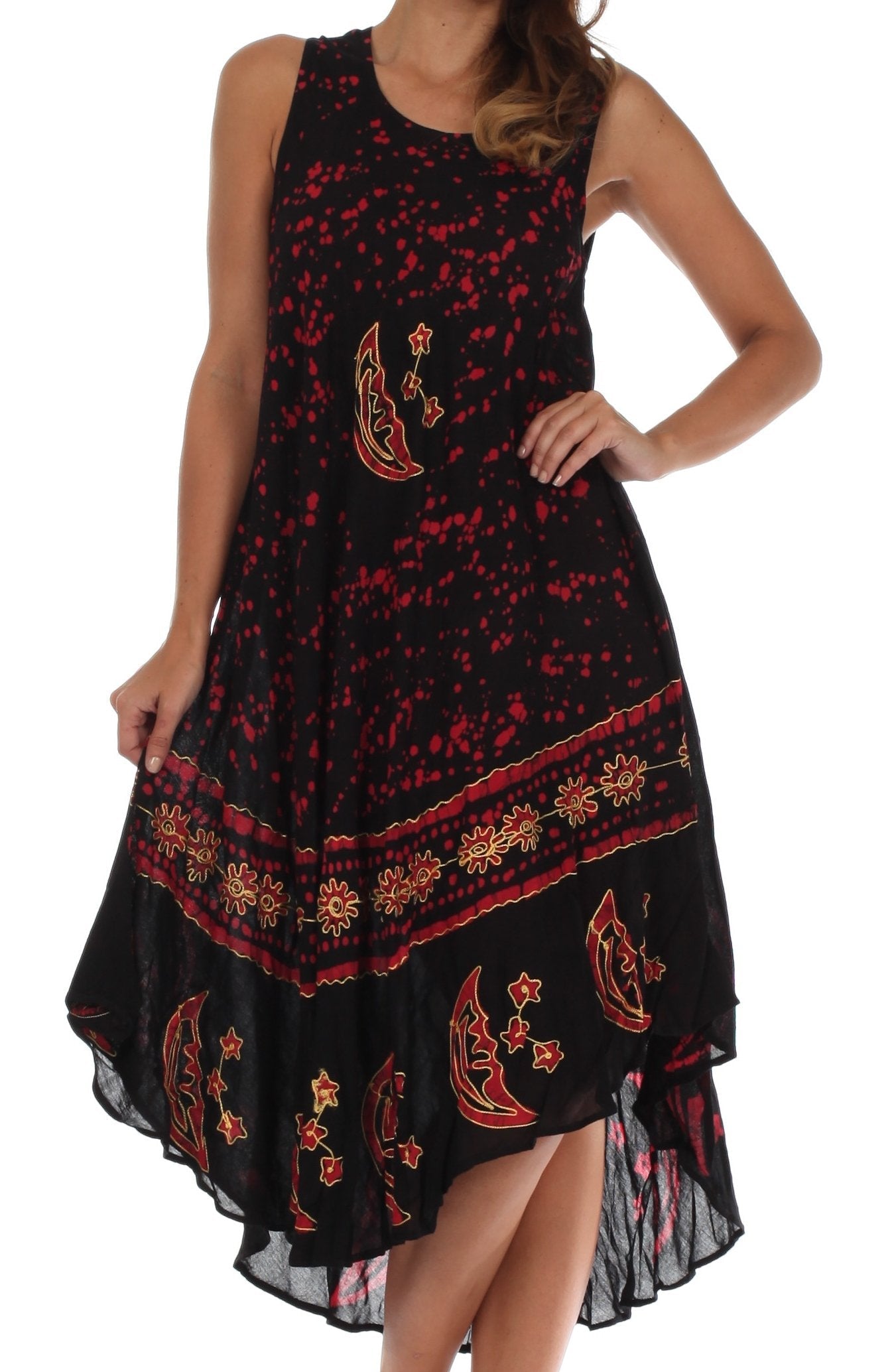 Black dress with red and gold floral patterns worn by a model on a white background