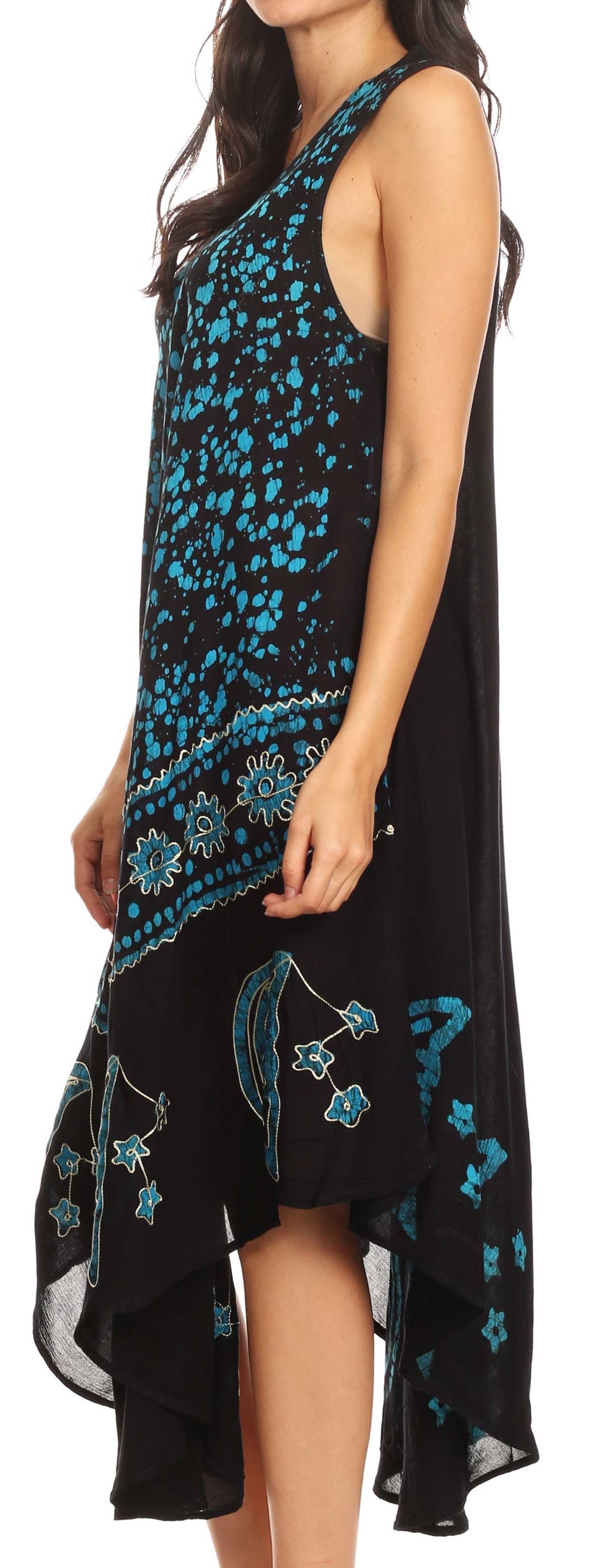 Black dress with blue floral patterns worn by a model on a white background