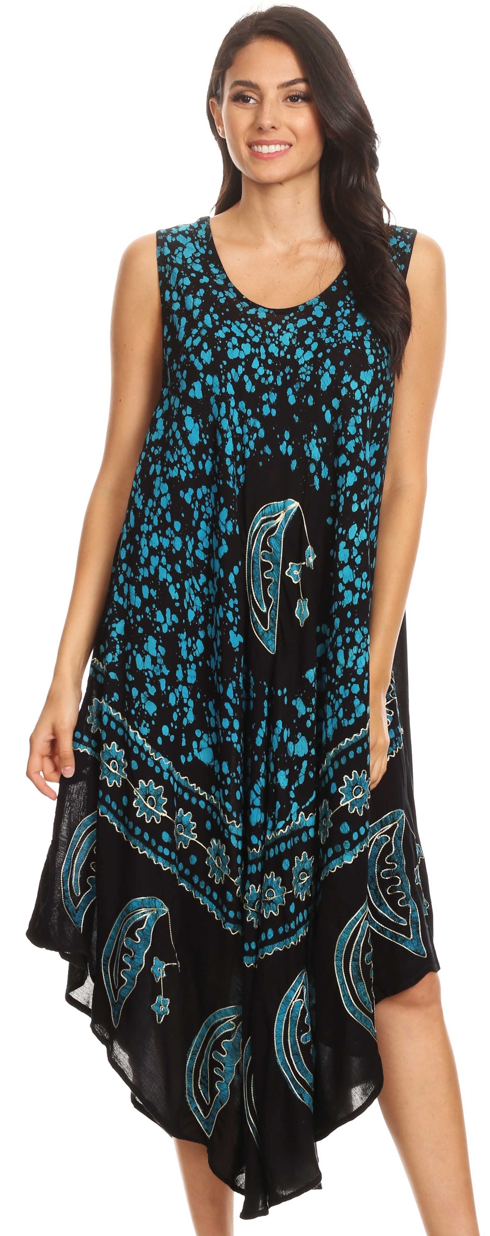 Woman wearing a black and blue patterned dress on a white background