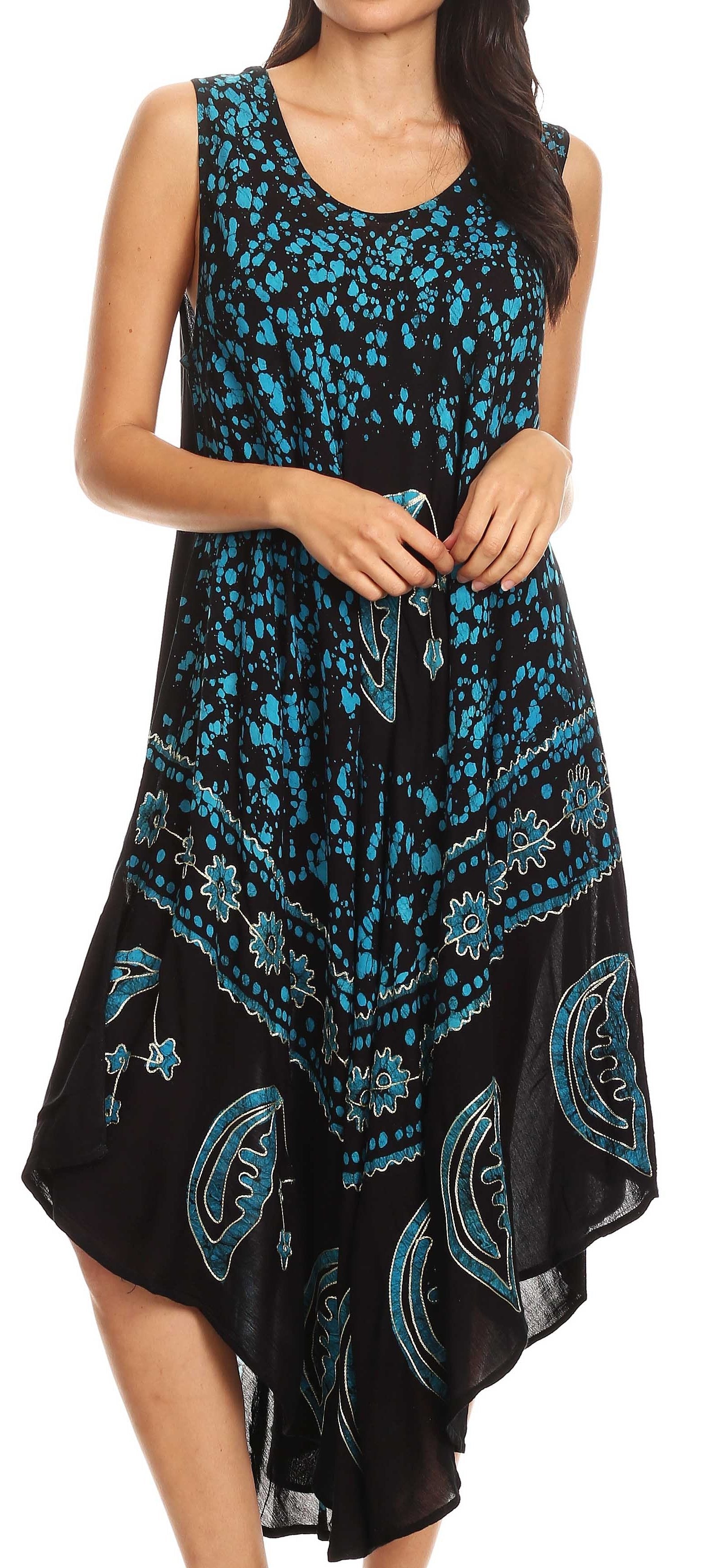 Woman wearing a black and blue floral dress on a white background