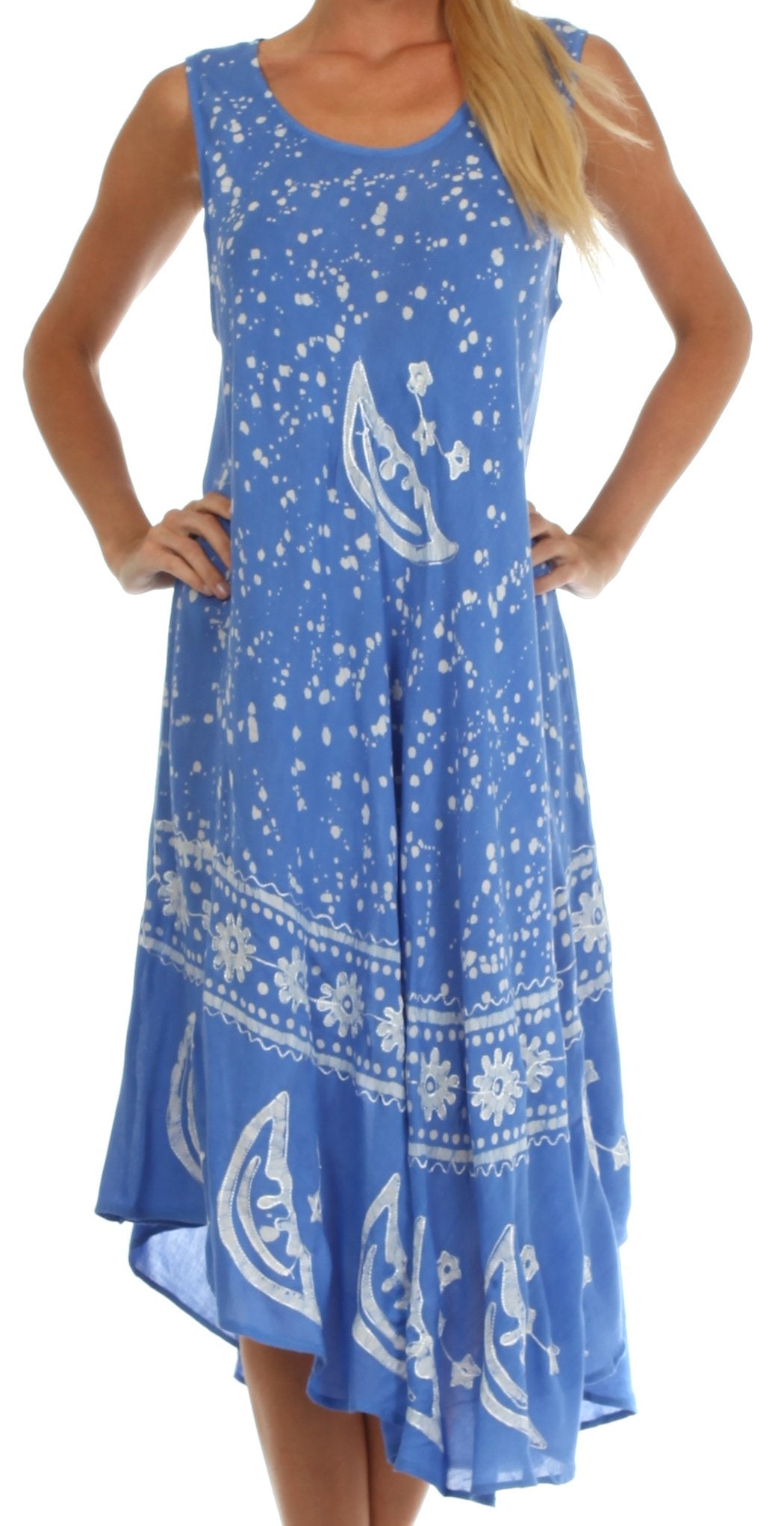 Blue dress with white patterns worn by a person on a white background