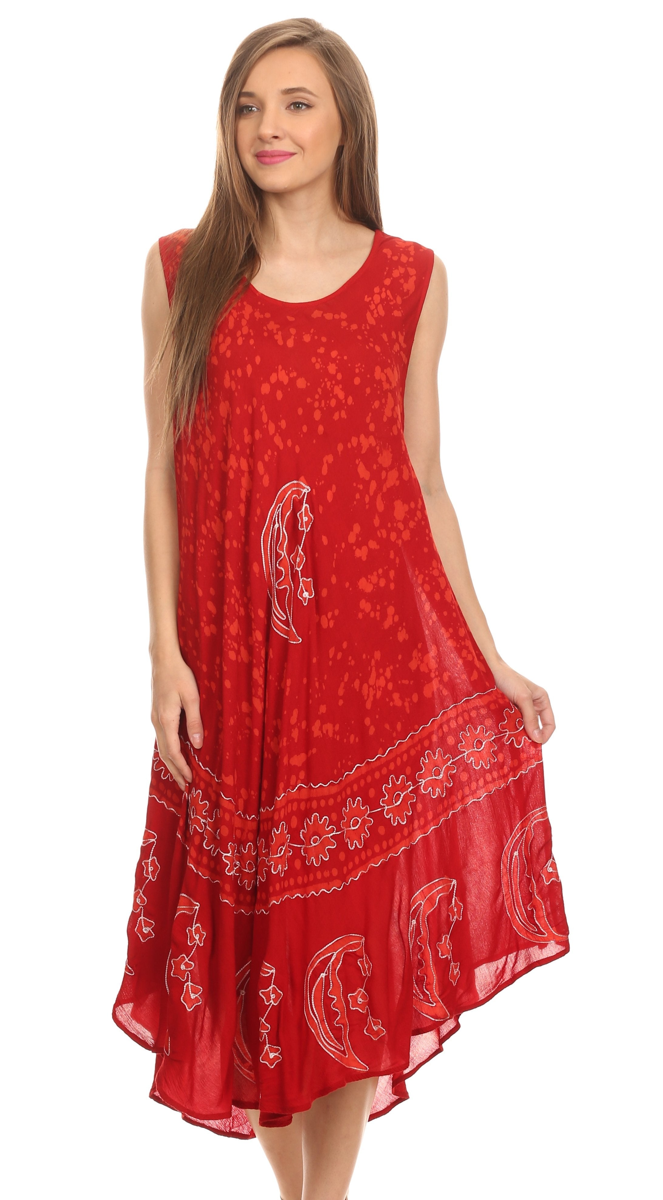 Woman wearing a red dress with white patterns on a white background
