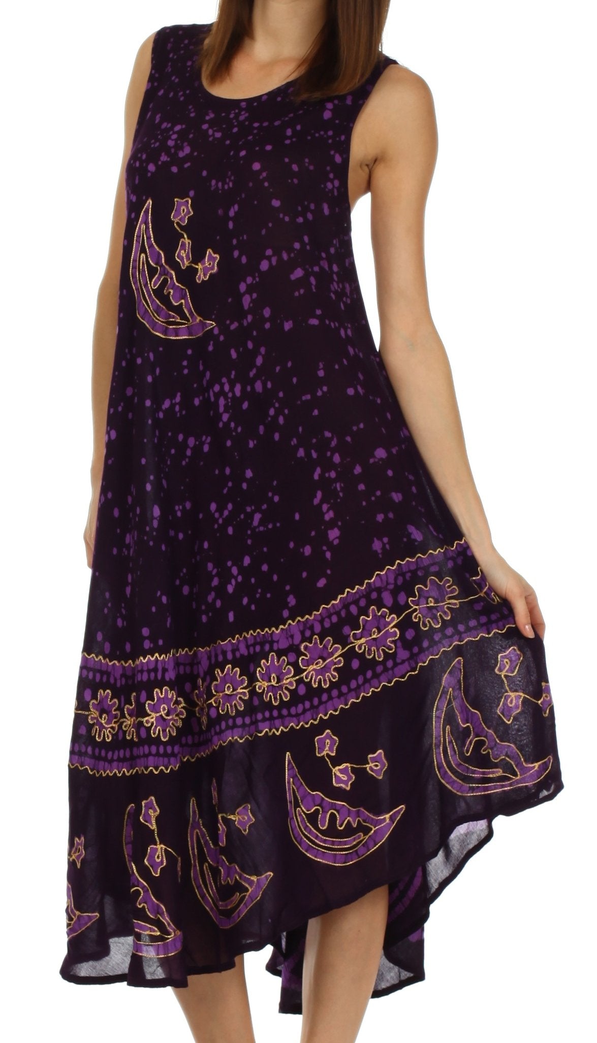 Purple dress with moon and star patterns on a white background