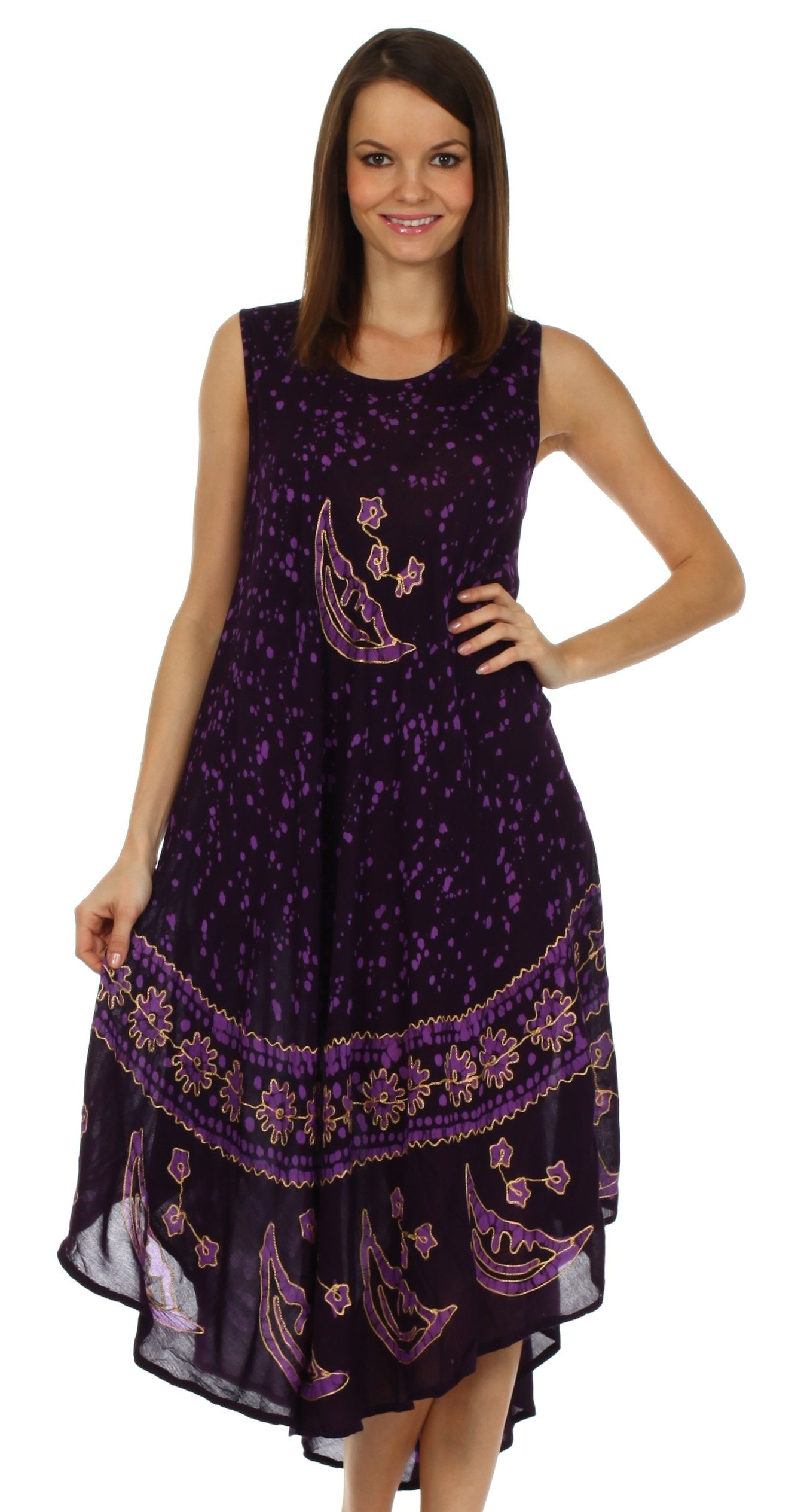 Woman wearing a purple dress with floral patterns on a white background