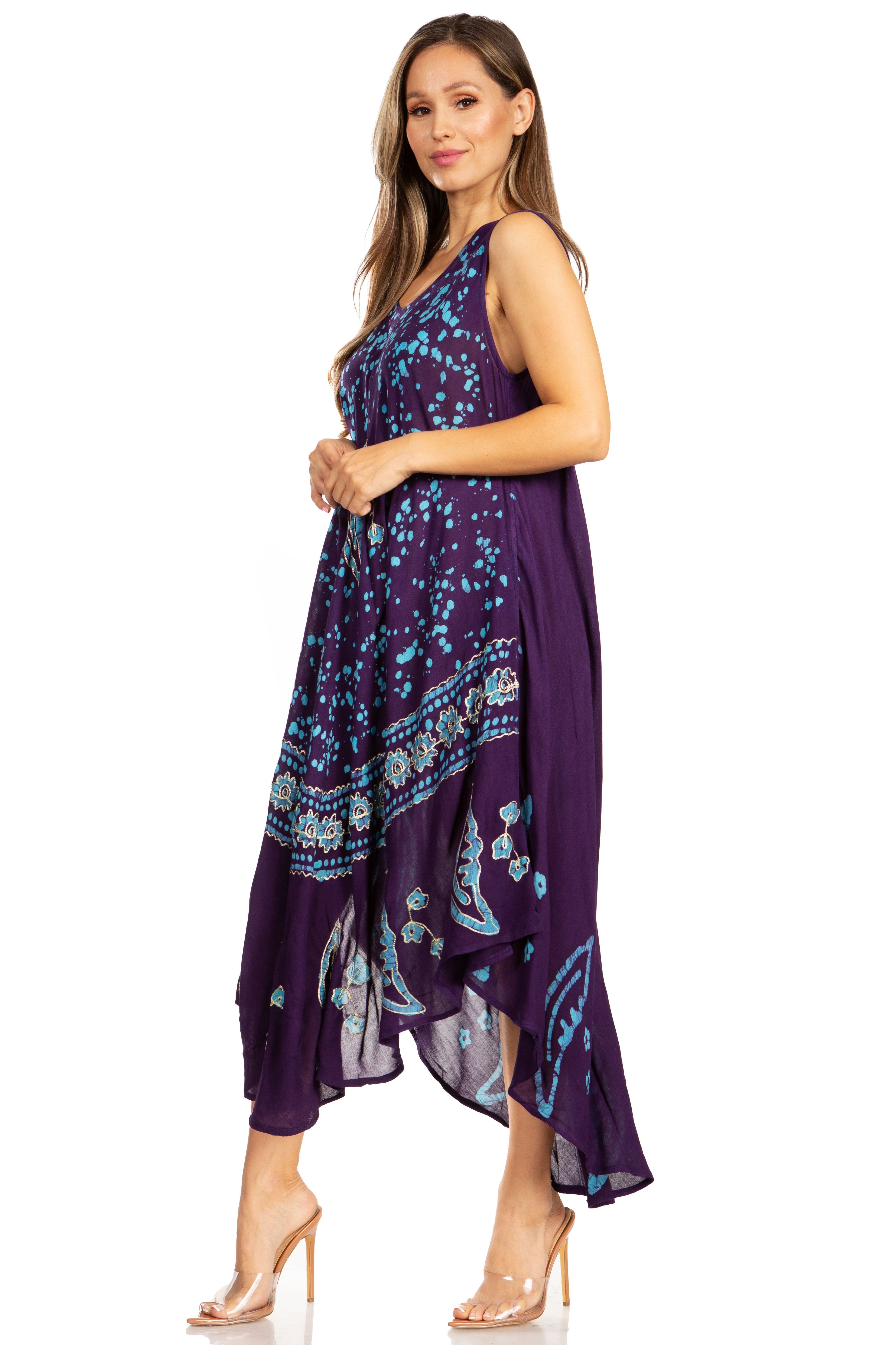 Woman wearing a purple floral dress on a white background