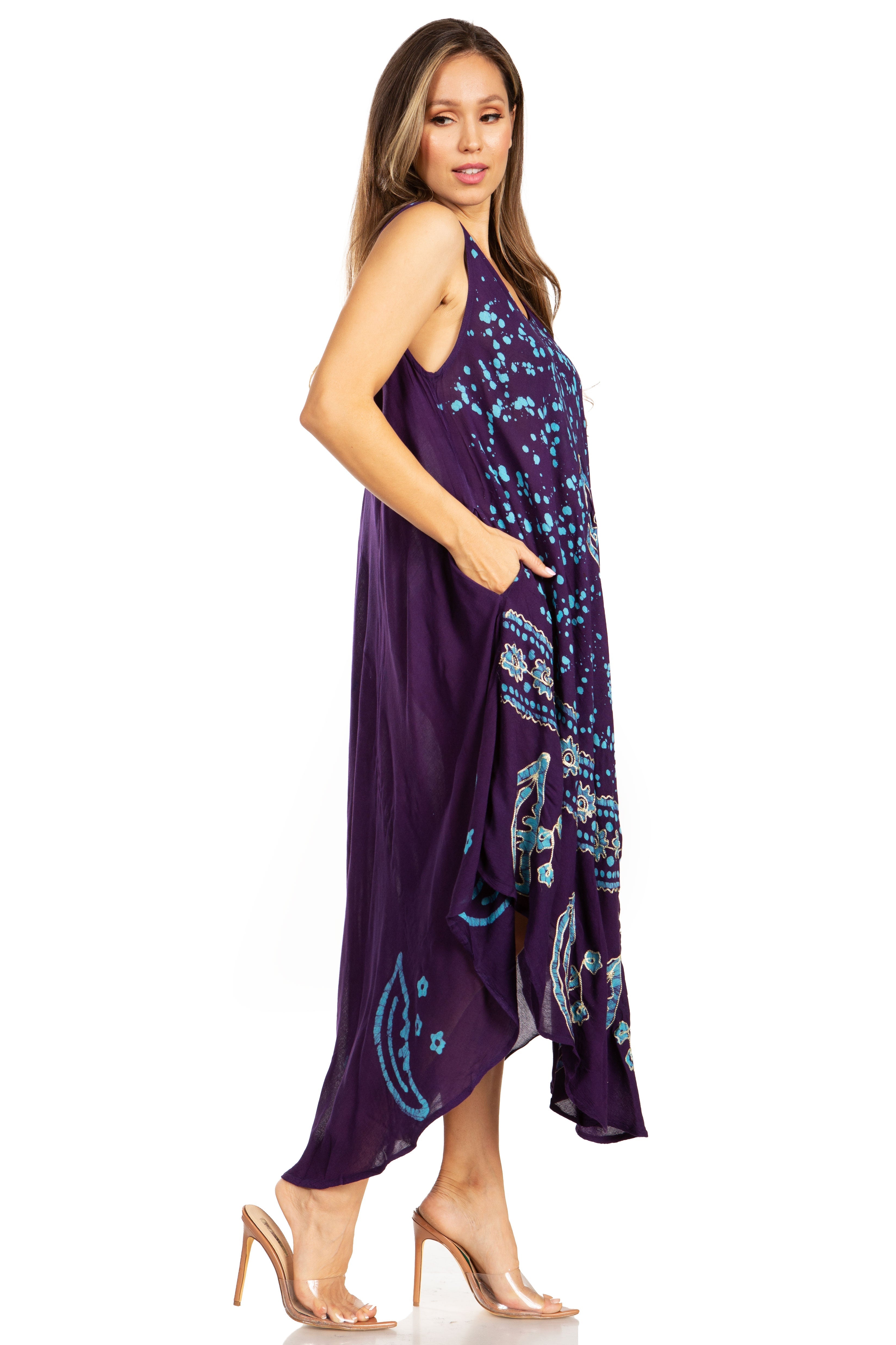 Woman wearing a purple floral dress on a white background