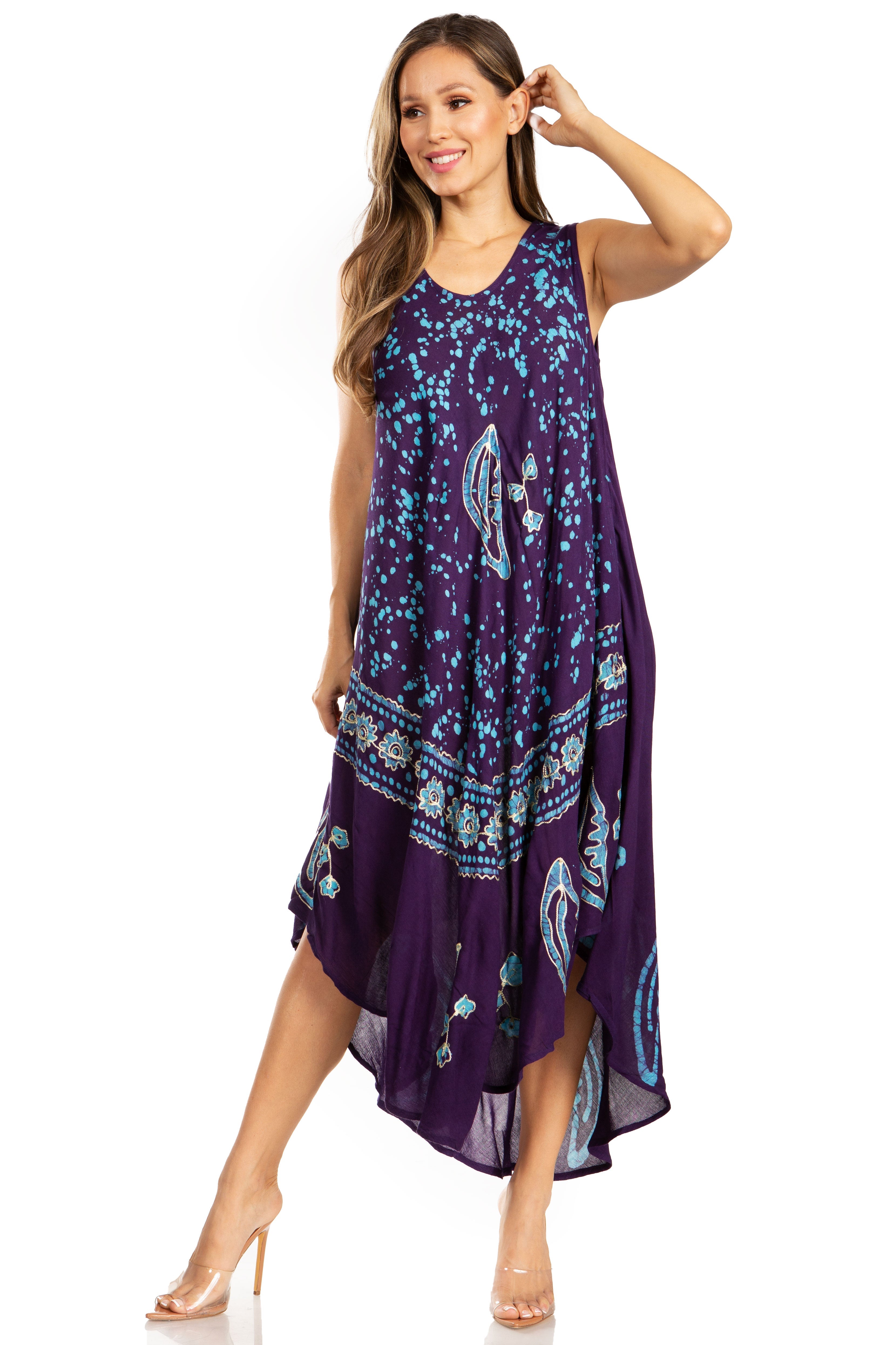 Woman wearing a purple floral dress on a white background