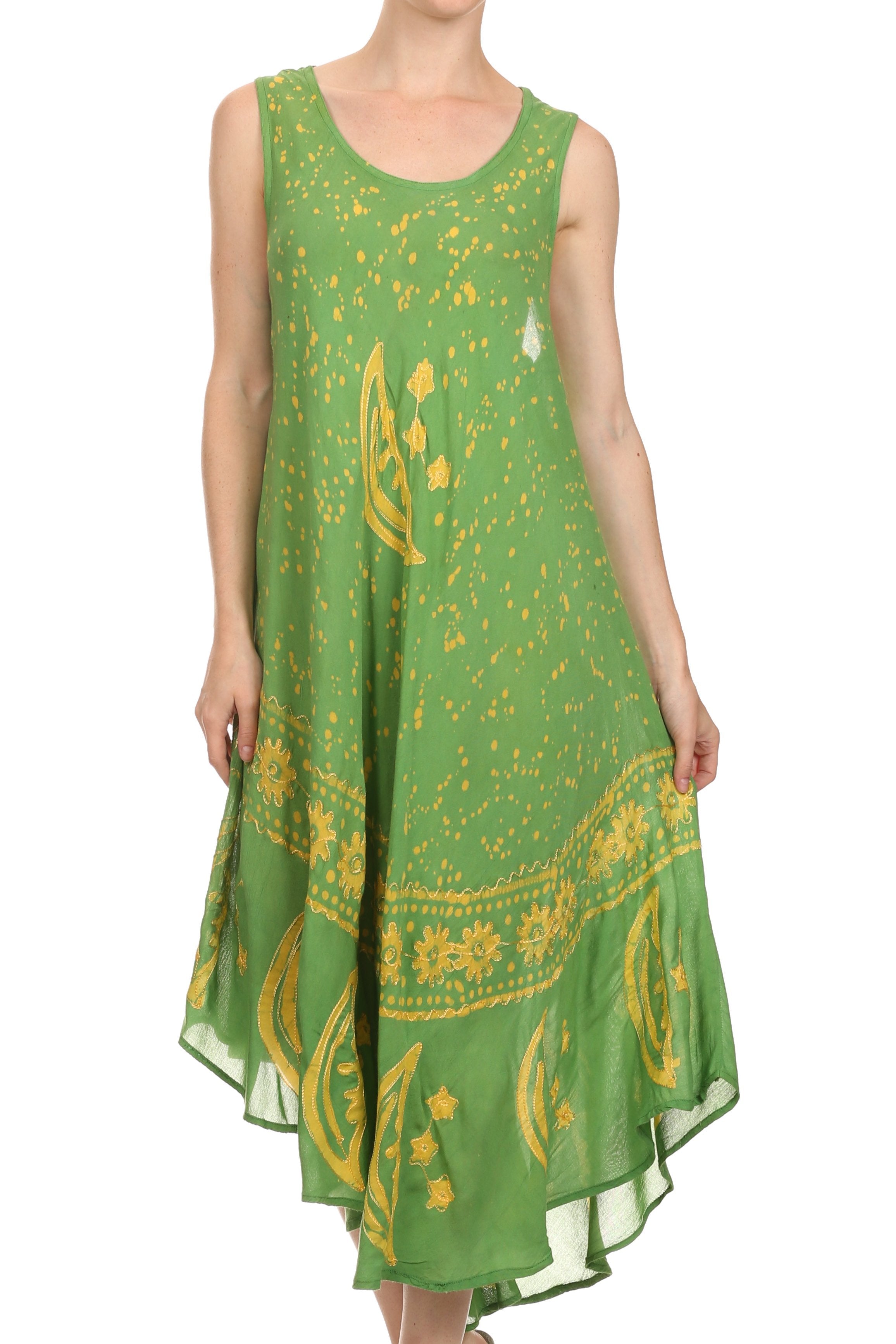 Green dress with yellow patterns on a white background