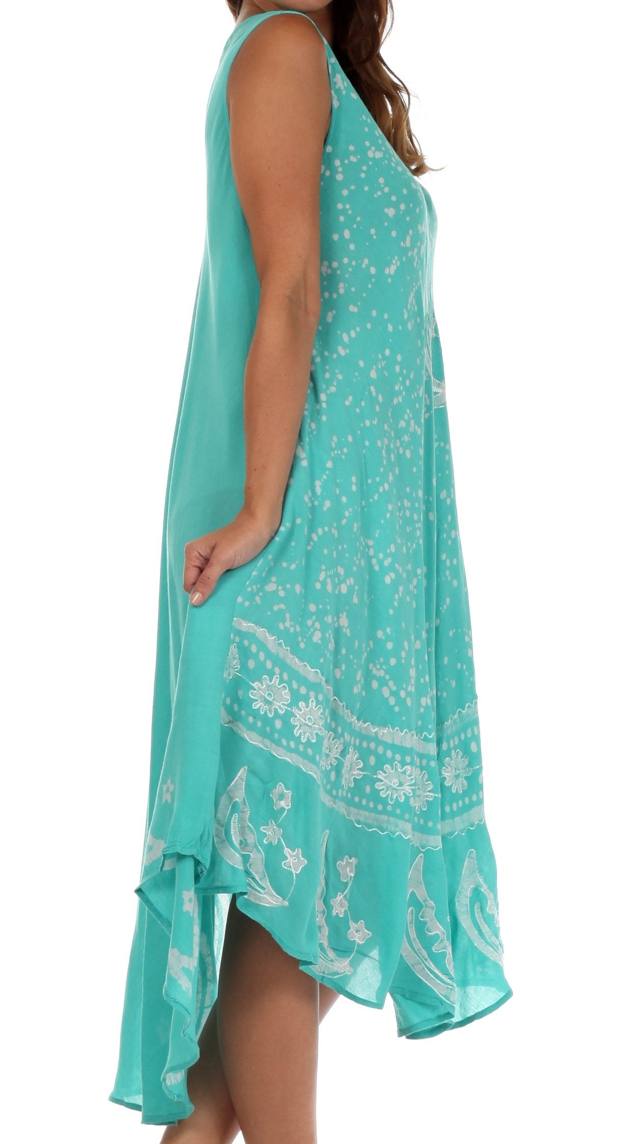 Turquoise dress with white patterns on a white background