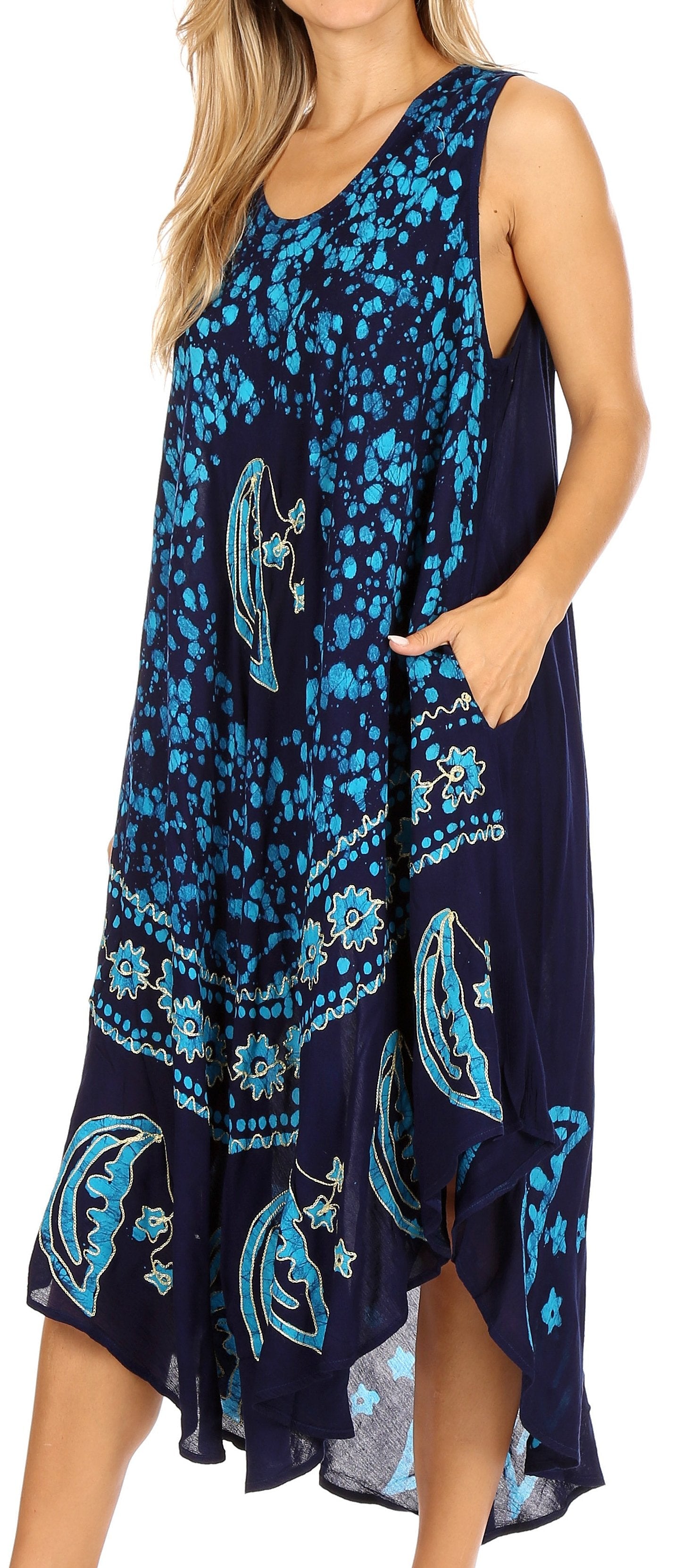 Navy sleeveless dress with blue floral patterns on a white background