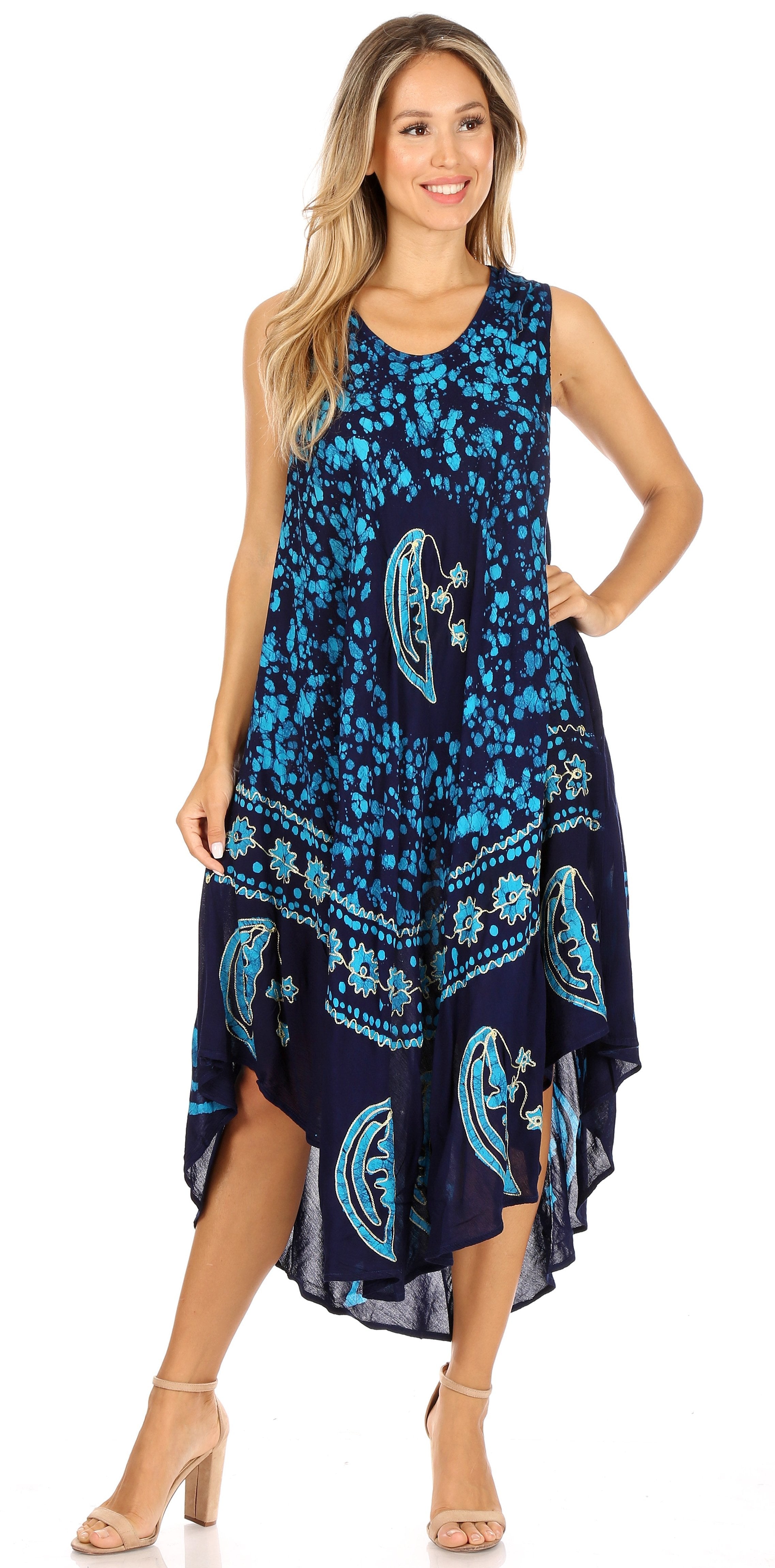 Woman wearing a blue and black patterned dress on a white background