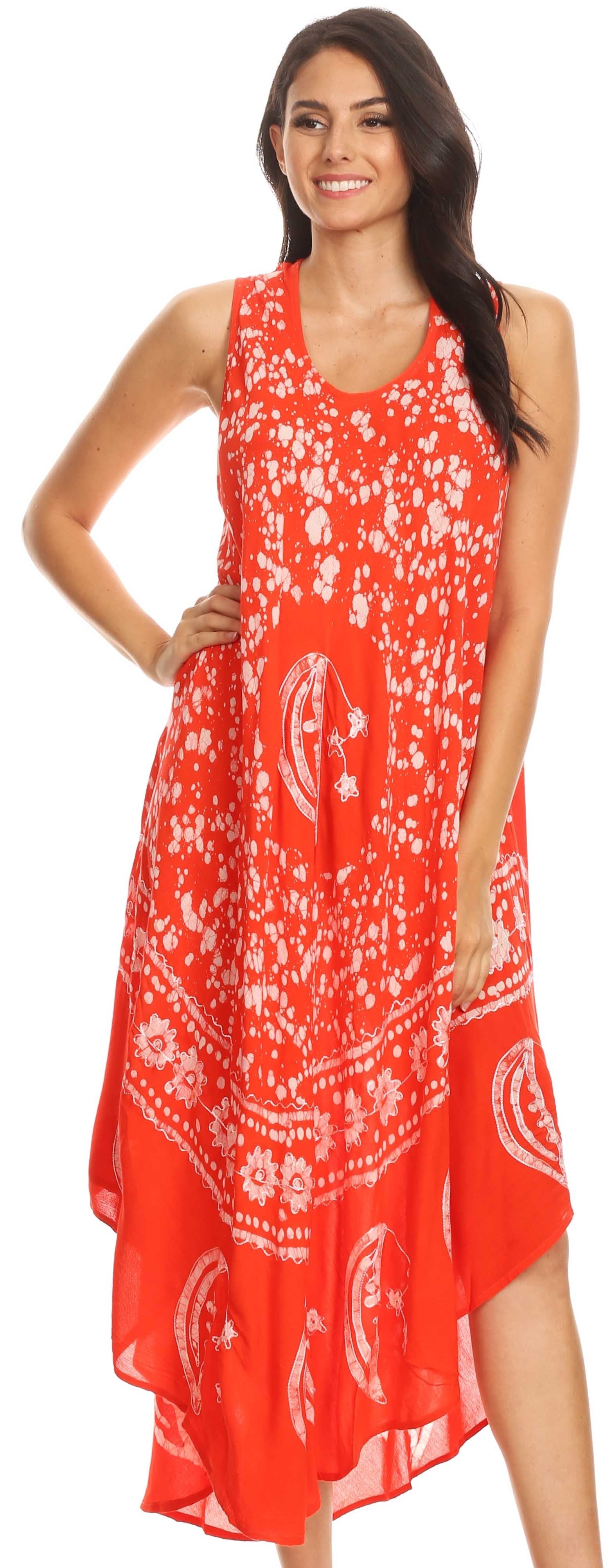 Woman wearing a red dress with white patterns on a white background